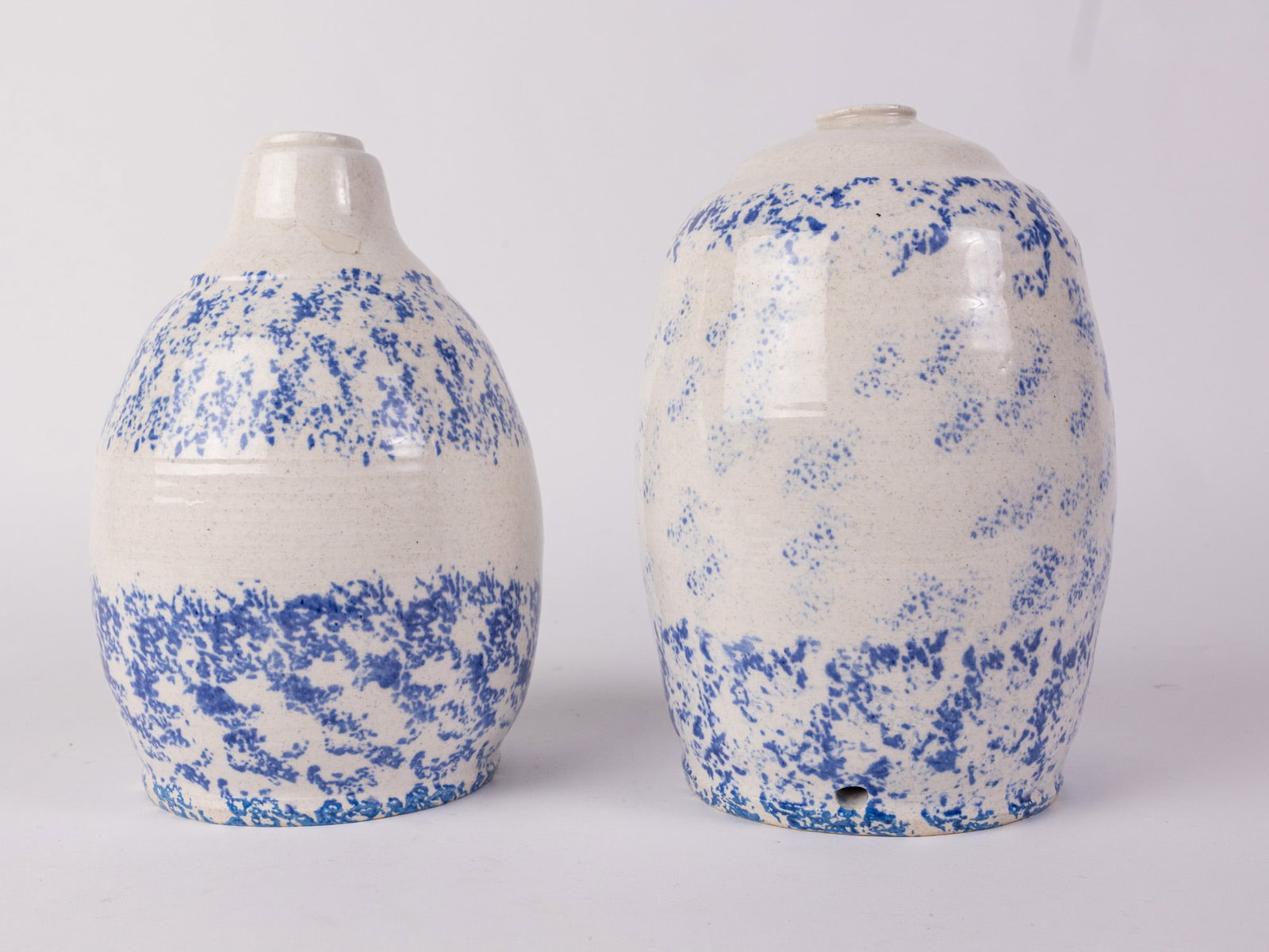 Pair of Vintage Blue Spongeware Decorated Lamp Bases: Pair of Vintage Blue Spongeware Decorated Lamp Bases Size 7" x 12" x 12" Literature Brooks Auction – Online Auction Terms & Conditions Contact: (856) 694-2960 | info@brooks.auction READ BEFORE