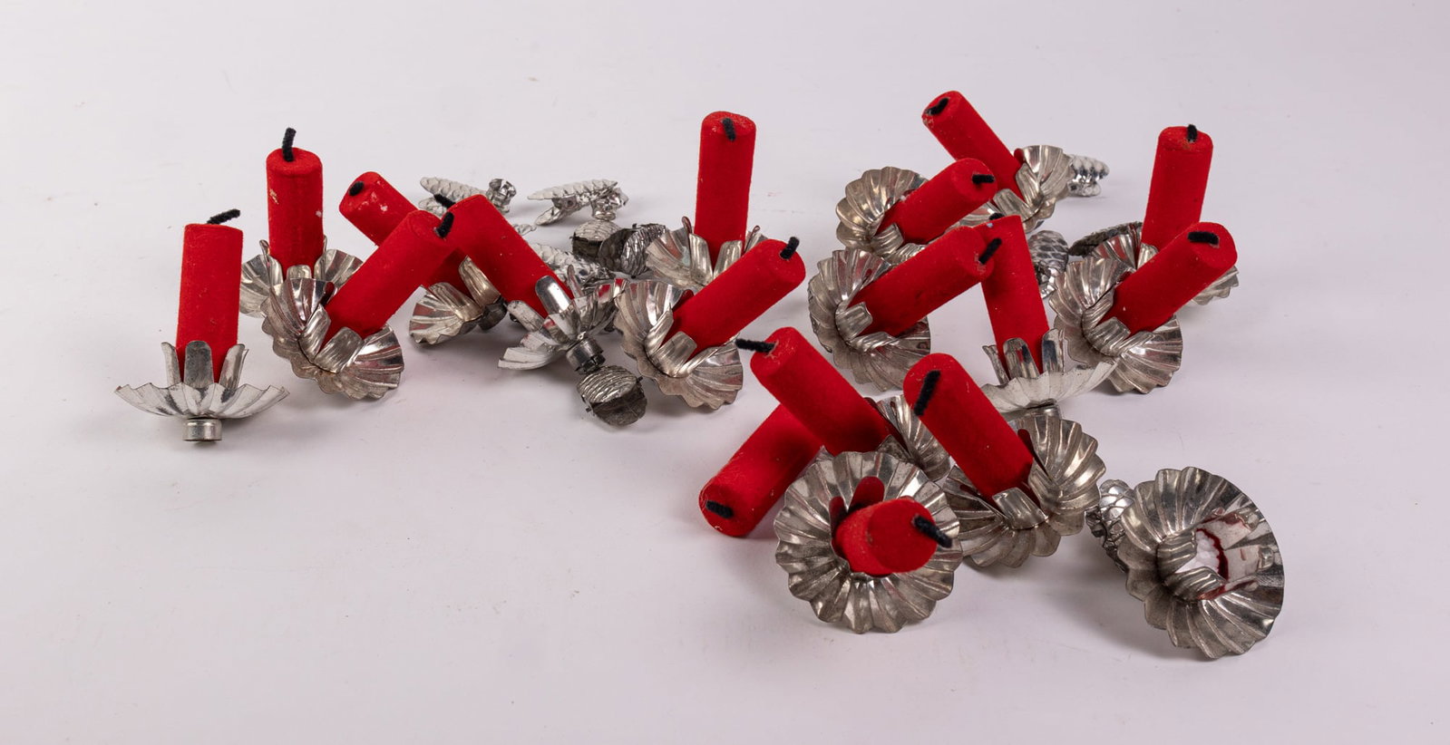 Grouping of Vintage Silver-toned Christmas Tree Candle Holders: Grouping of Vintage Silver-toned Christmas Tree Candle Holders Size 7" x 12" x 12" Literature Brooks Auction – Online Auction Terms & Conditions Contact: (856) 694-2960 | info@brooks.auction