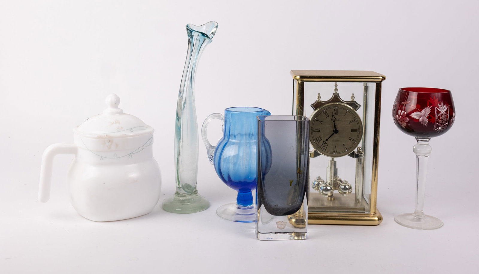 Decorative Assortment ft. Swung Vase: Decorative Assortment ft. Swung Vase Size 7" x 12" x 12" Literature Brooks Auction – Online Auction Terms & Conditions Contact: (856) 694-2960 | info@brooks.auction READ BEFORE YOU BID: We want