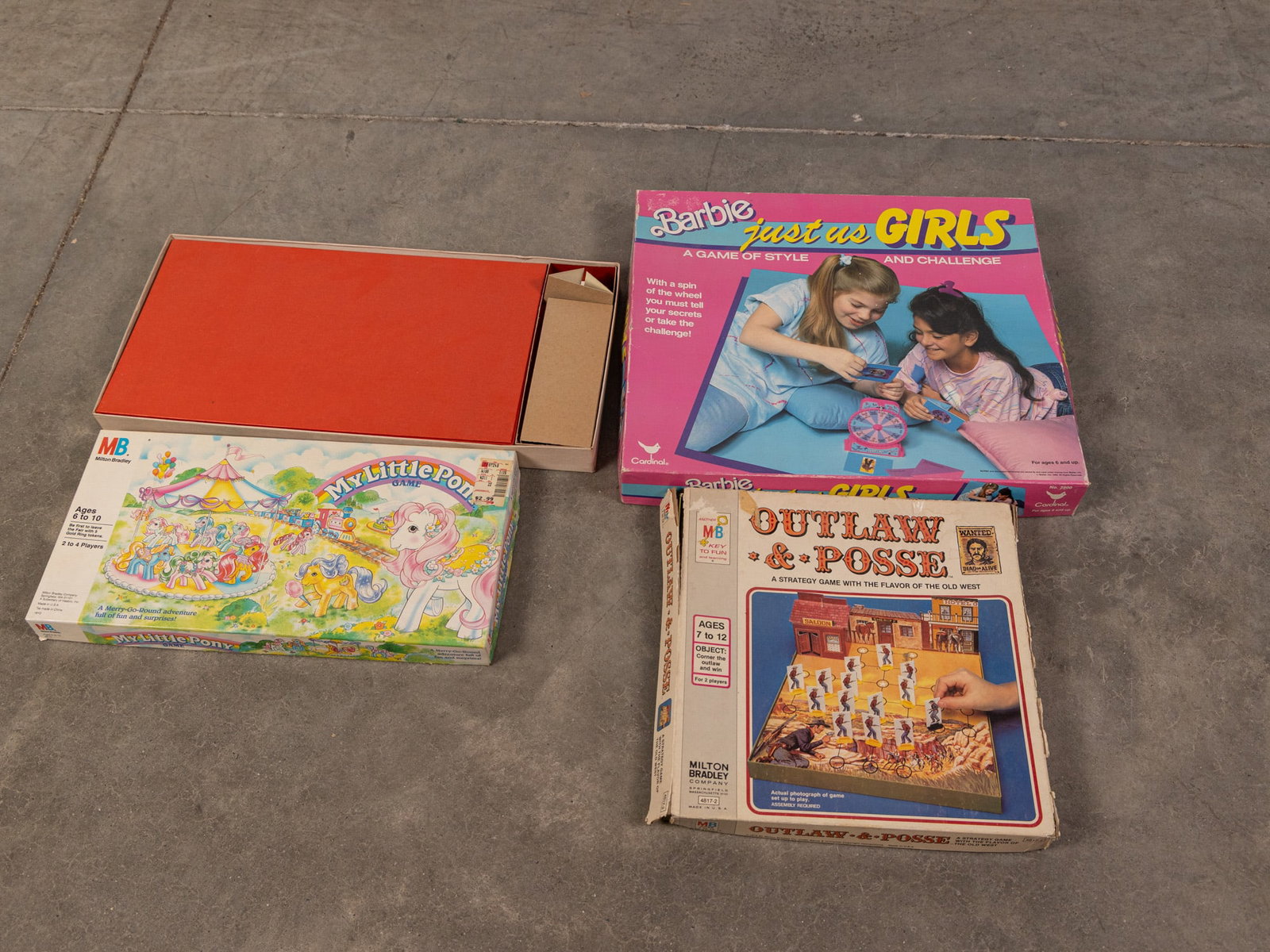 Four Vintage Board Games: Four (4) Vintage Board Games: Barbie: Just Us Girls - Milton Bradley Outlaw & Posse - Milton Bradley My Little Pony Game - The Pink Panther Game (top lid is missing) Size 2" x 15" x 17" Literature Bro