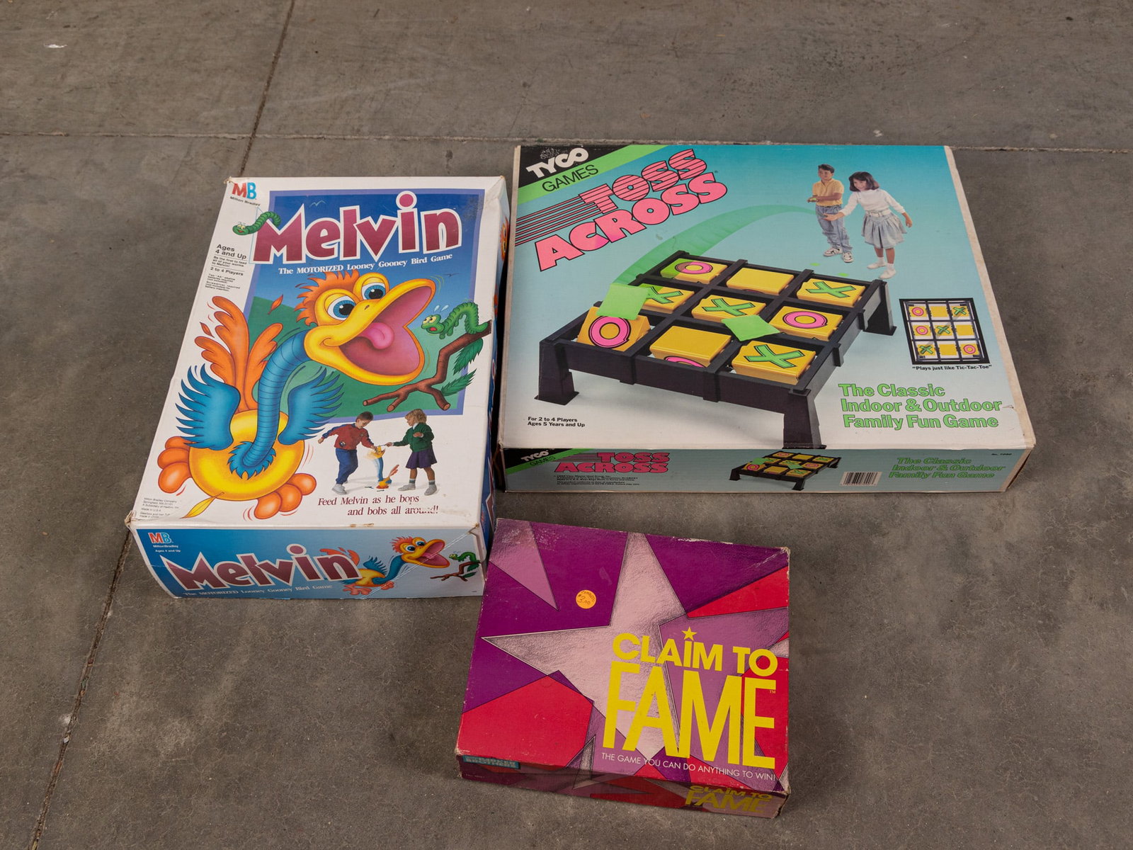 Three Vintage Games ft. Melvin: Three (3) Vintage Games: Milton Bradley Melvin - Tyco Toss Across - Parker Brothers Claim to Fame Size 4" x 22" x 18 Literature Brooks Auction – Online Auction Terms & Conditions Contact: (856)