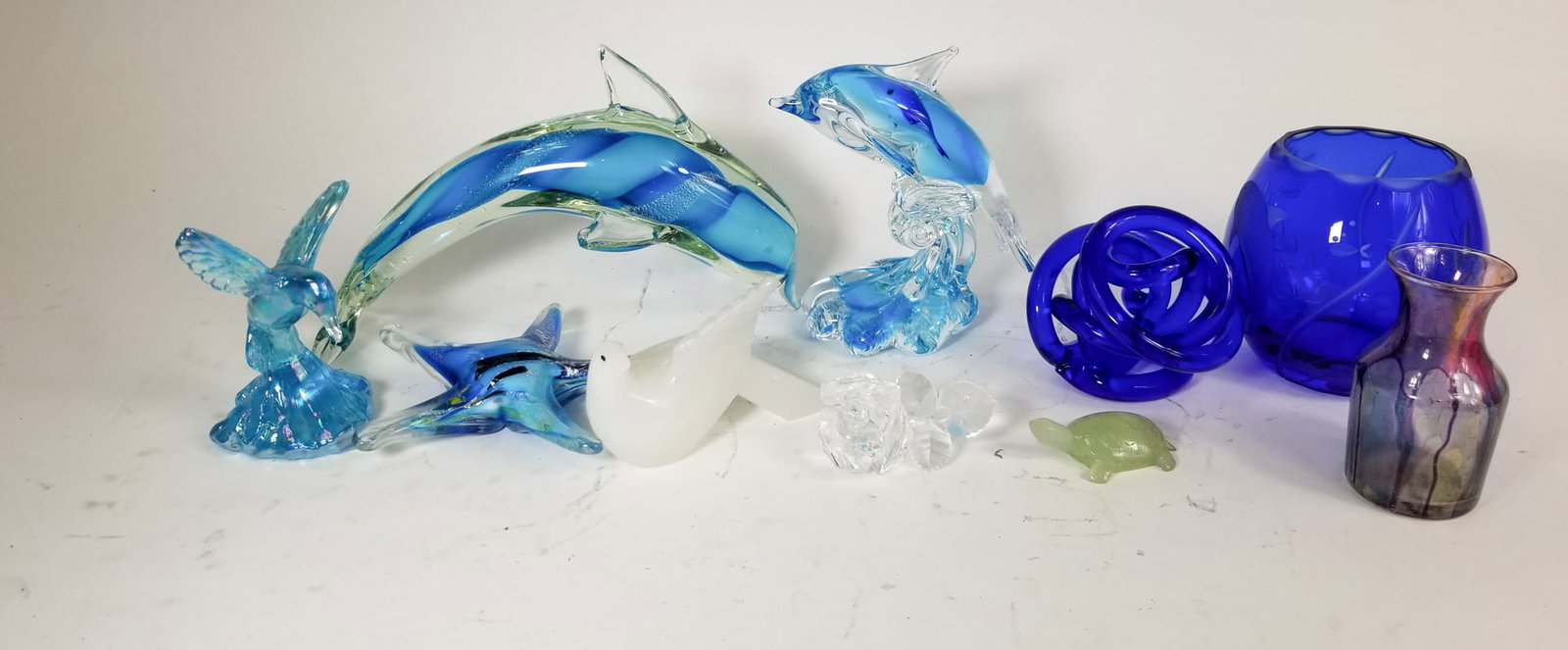 Assortment of Art Glass: Assortment of Art Glass Size 7" x 12" x 12" Literature Brooks Auction – Online Auction Terms & Conditions Contact: (856) 694-2960 | info@brooks.auction READ BEFORE YOU BID: We want you t