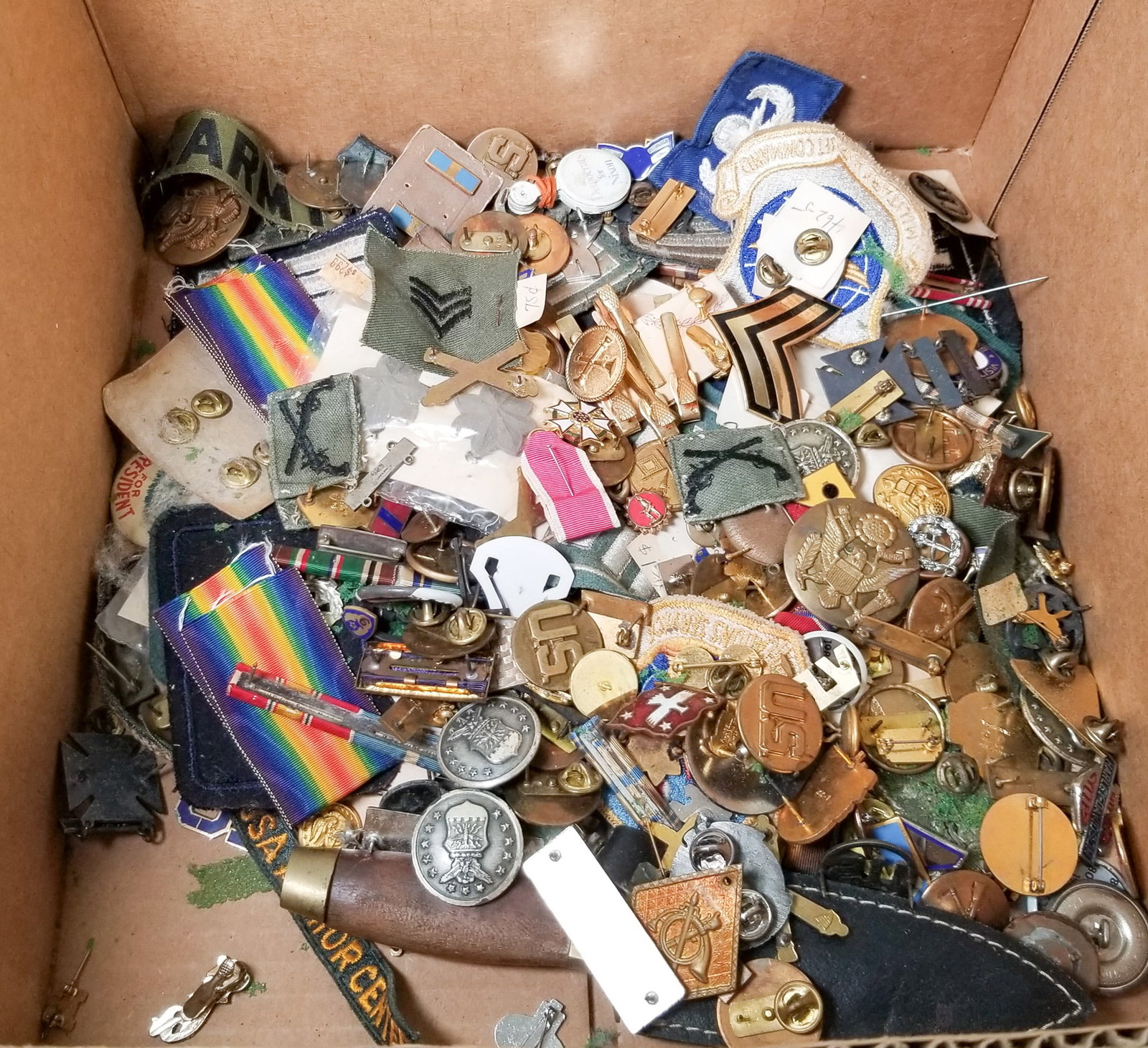 Large Assortment of Vintage Pins and Patches ft. Sterling & Mostly Militaria: Large Assortment of Vintage Pins and Patches ft. Sterling & Mostly Militaria Size 7" x 12" x 12" Literature Brooks Auction – Online Auction Terms & Conditions Contact: (856) 694-2960 | info@bro