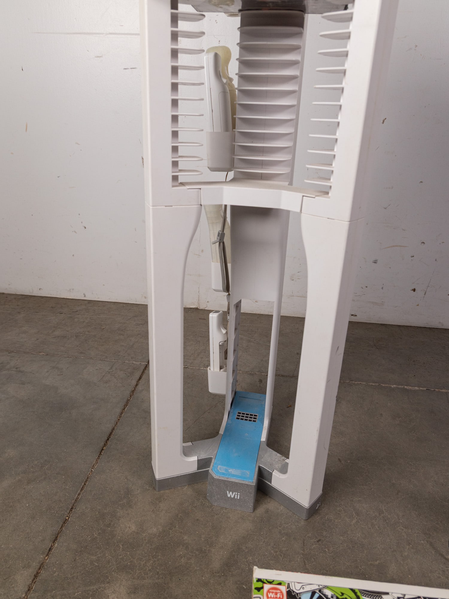 Large Vintage Video Game Assortment ft. Wii Tower Storage and Wii Remotes - 4