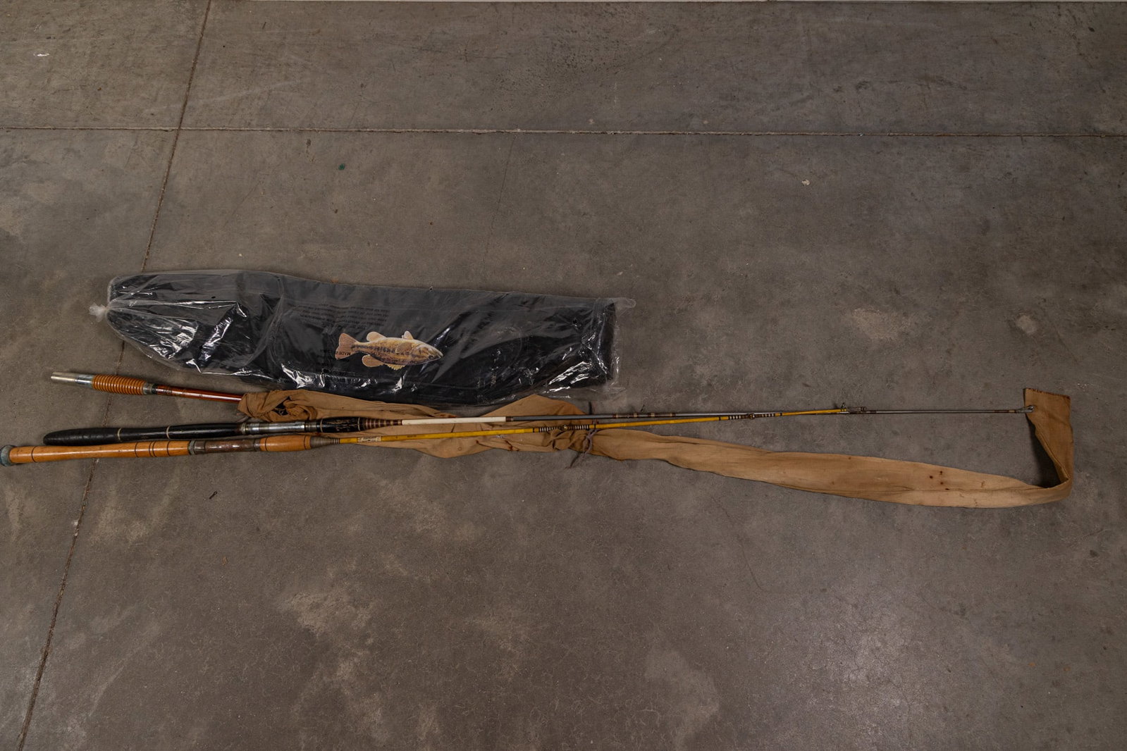 Three Vintage Fishing Rods and Bag: Three Vintage Fishing Rods and Bag Size 70" H Literature Brooks Auction – Online Auction Terms & Conditions Contact: (856) 694-2960 | info@brooks.auction READ BEFORE YOU BID: We want you to