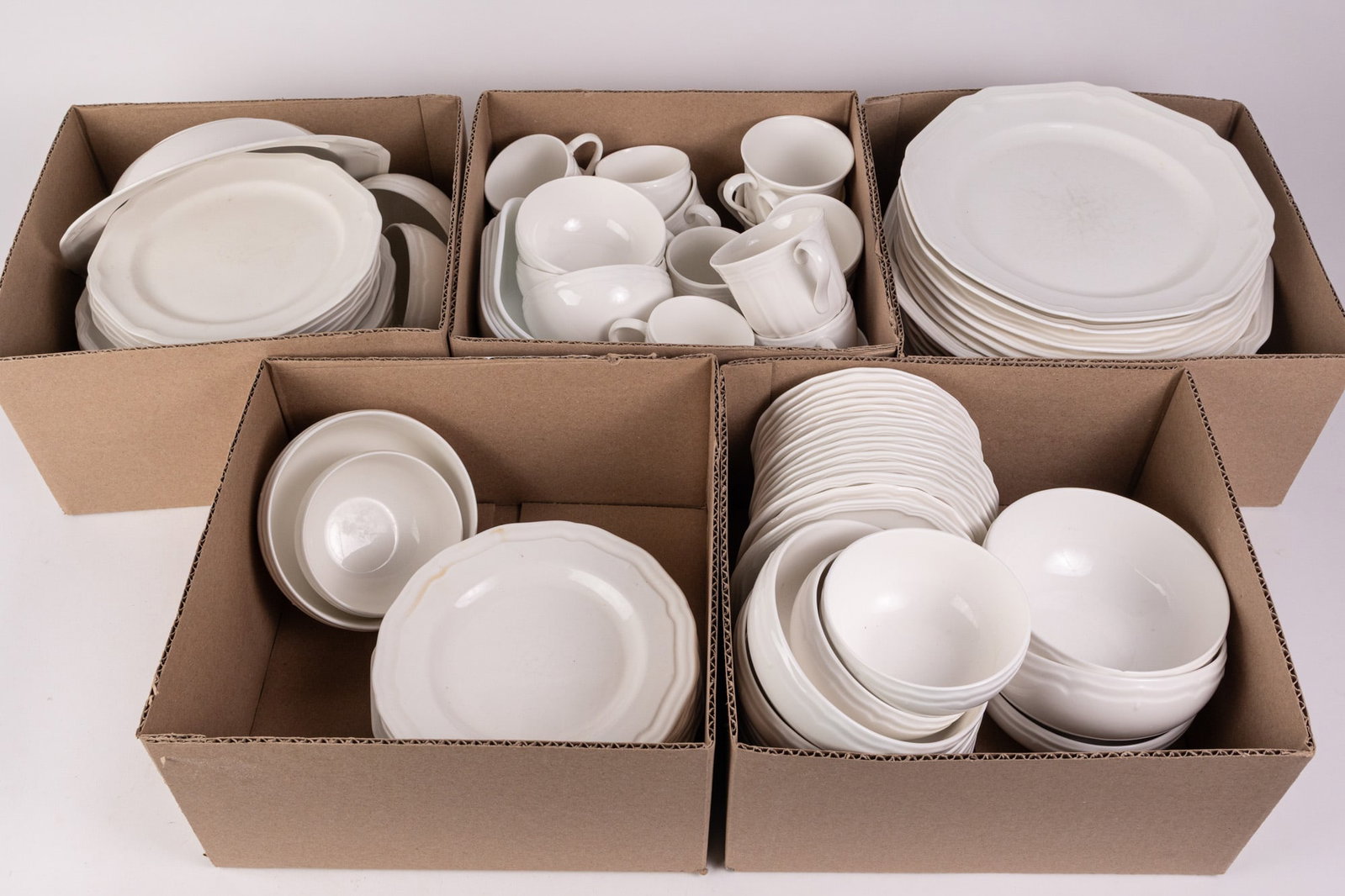 Lot of Assorted White Porcelain Dishware Featuring Mikasa: Lot of Assorted White Porcelain Dishware Featuring Mikasa Size 7" x 12" x 12" Literature Brooks Auction – Online Auction Terms & Conditions Contact: (856) 694-2960 | info@brooks.auction READ