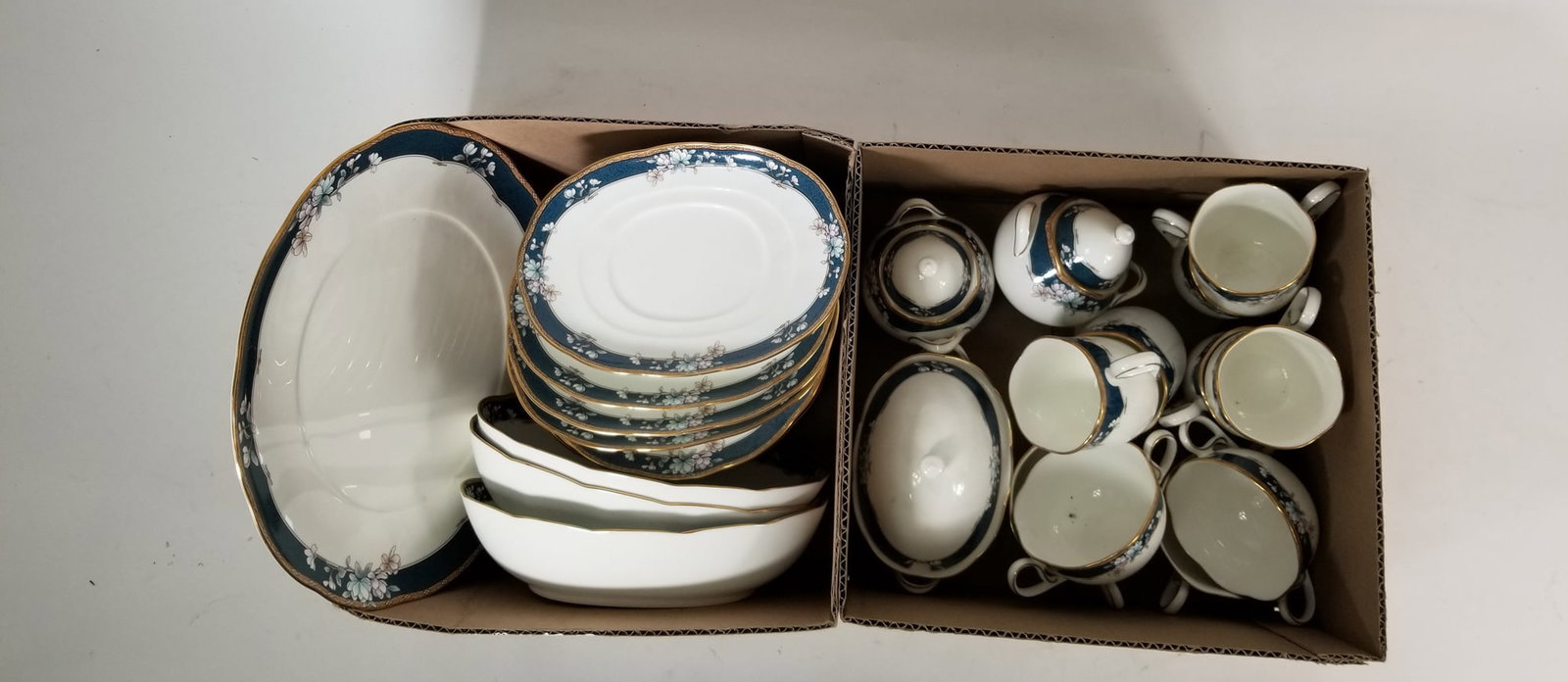 Noritake Porcelain Partial Dish Set: Noritake Porcelain Partial Dish Set Size 7" x 12" x 12" Literature Brooks Auction – Online Auction Terms & Conditions Contact: (856) 694-2960 | info@brooks.auction READ BEFORE YOU BID: We want