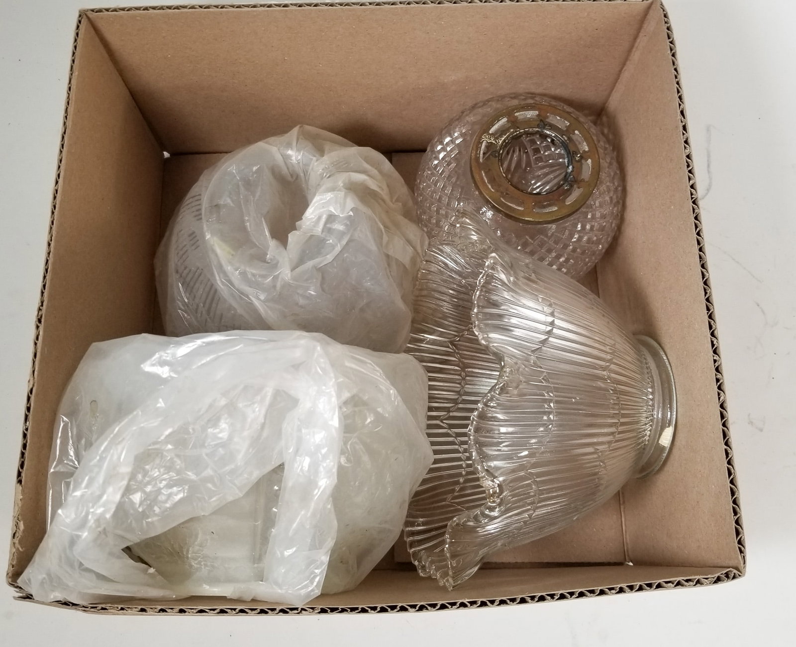 Four Glass Light Shades: Four (4) Glass Light Shades Size 7" x 12" x 12" Literature Brooks Auction – Online Auction Terms & Conditions Contact: (856) 694-2960 | info@brooks.auction READ BEFORE YOU BID: We want you to