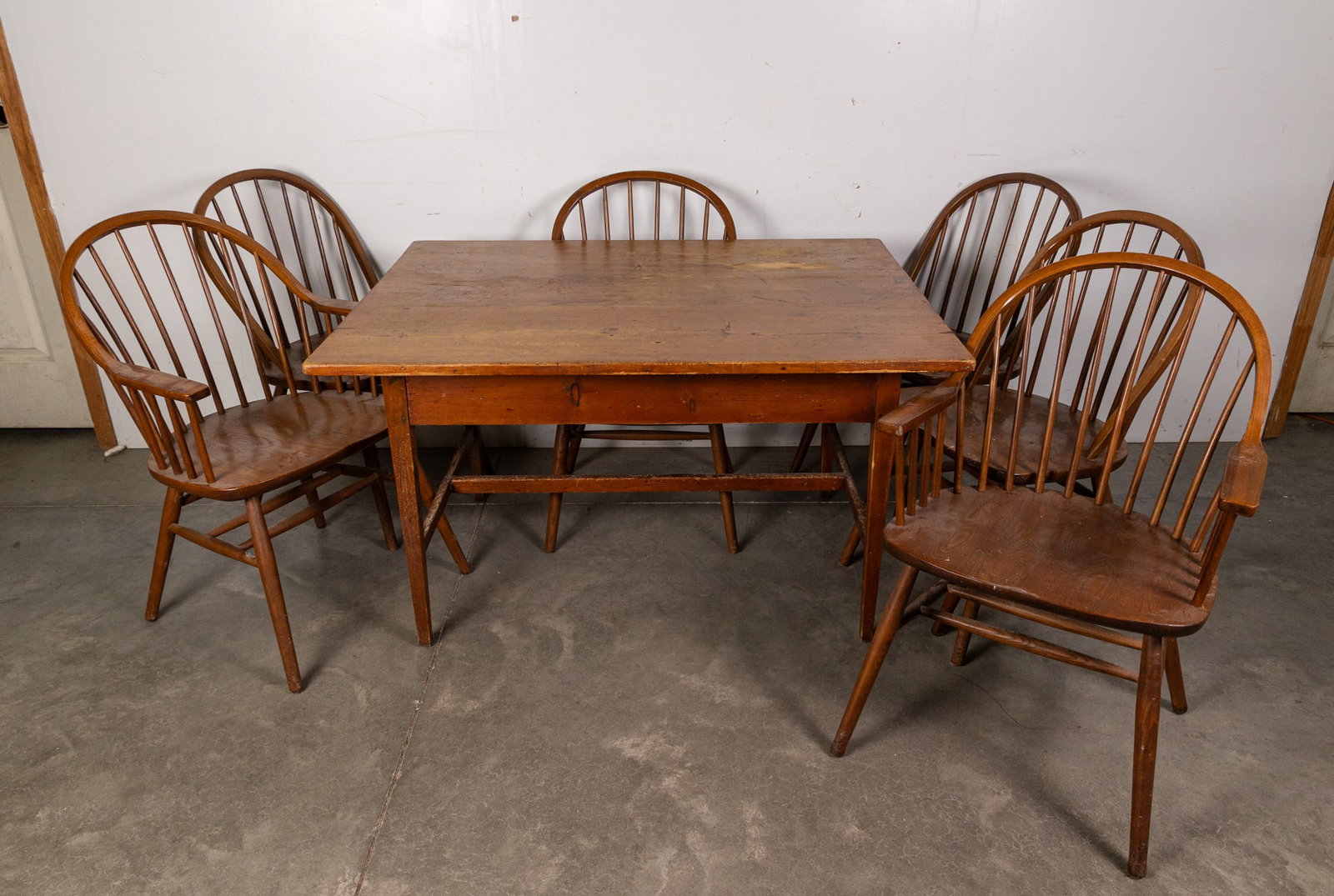 Antique Primitive Dining Table with Six Windsor Chairs: Antique Primitive Dining Table with Six Windsor Chairs Size 27" x 47" x 35" Literature Brooks Auction – Online Auction Terms & Conditions Contact: (856) 694-2960 | info@brooks.auction READ