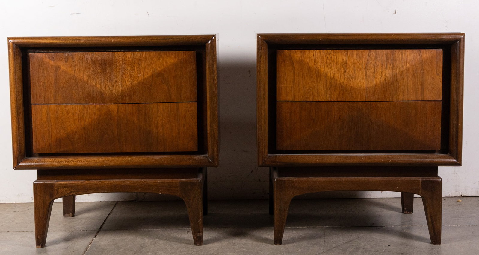 United Furniture Company Diamond Front Pair of MCM Nightstands: United Furniture Company Diamond Front Pair of MCM Nightstands Size 24" x 23" x 16" Literature Brooks Auction – Online Auction Terms & Conditions Contact: (856) 694-2960 | info@brooks.auction <