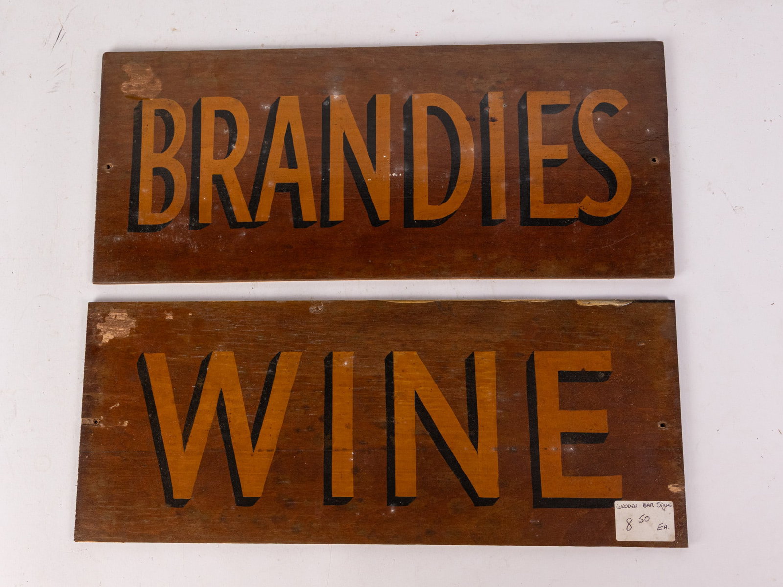 Pair of Hand-Painted Alcohol Advertisment Signs: Pair of Hand-Painted Alcohol Advertisment Signs Size 7" x 16" Literature Brooks Auction – Online Auction Terms & Conditions Contact: (856) 694-2960 | info@brooks.auction READ BEFORE YOU BID: We