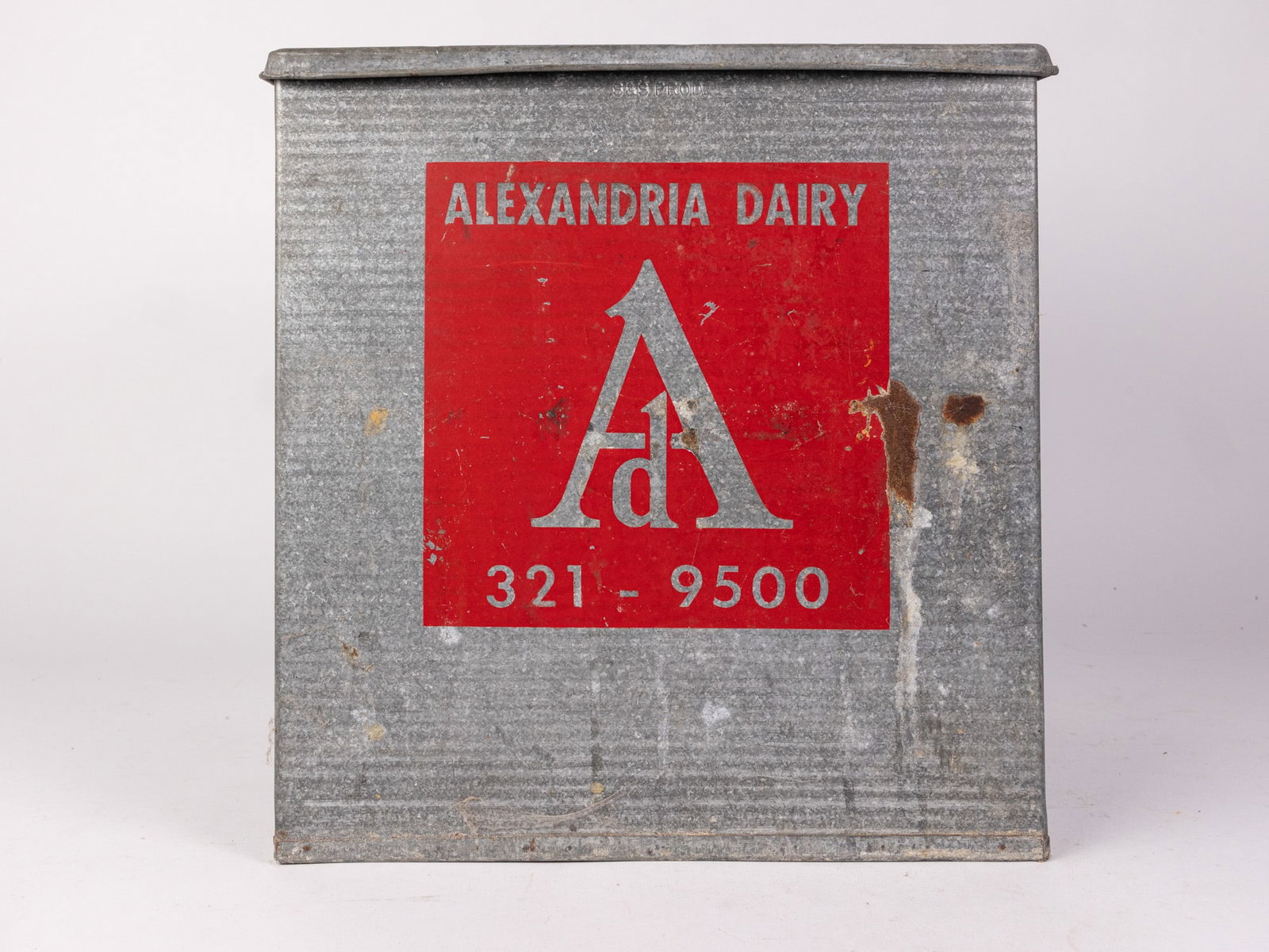 Alexandria Diary Vintage Metal Dairy Container: Classic vintage metal dairy container with red vintage logo for Alexandria Dairy. Great potential for repurposing/upcycling. Size 14" x 13" x 11" Literature Brooks Auction – Online Auction