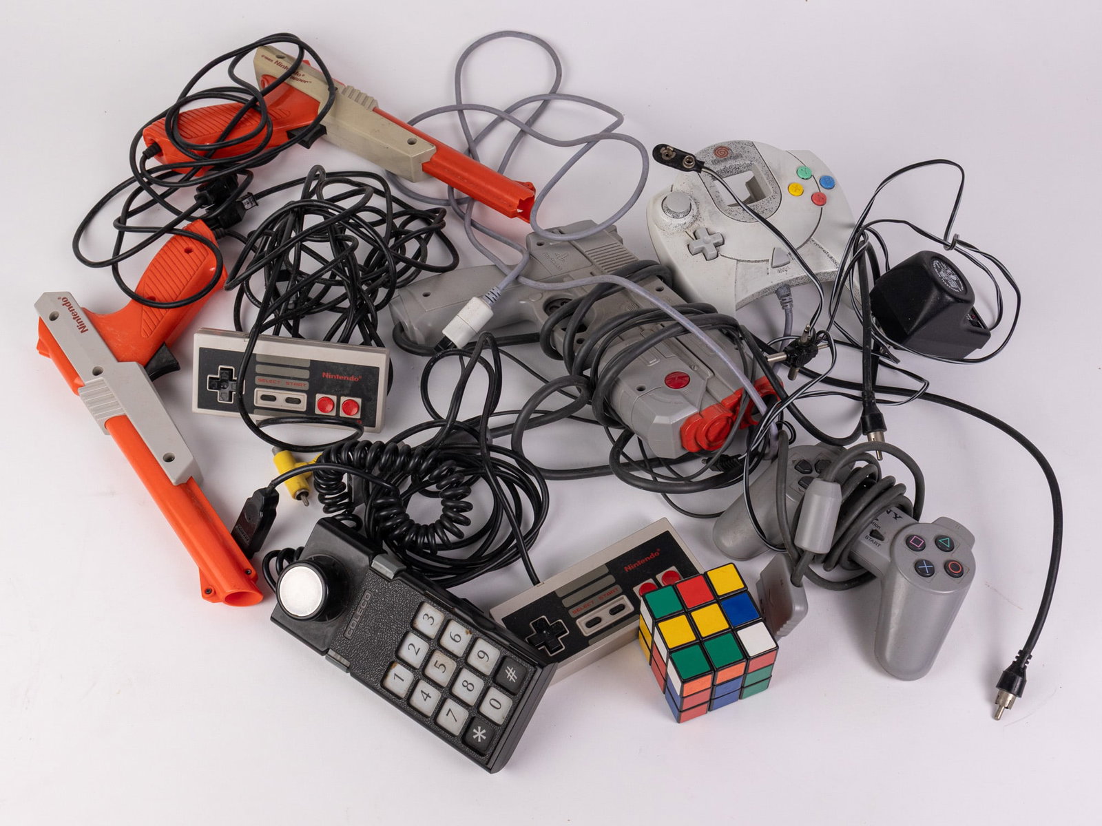 Assortment of Vintage Game Console Controllers - 2