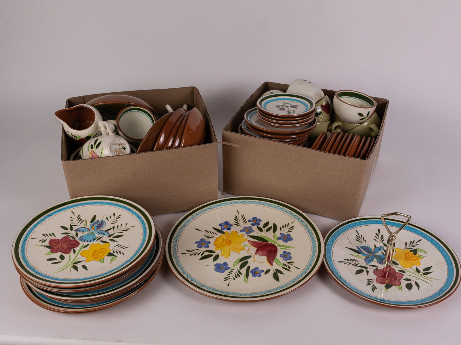 Large Lot of Vintage Stangl Dishware: Lot includes both "Magnolia" and "Country Garden" pieces. Size 7" x 12" x 12" Literature Brooks Auction – Online Auction Terms & Conditions Contact: (856) 694-2960 | info@brooks.auction READ