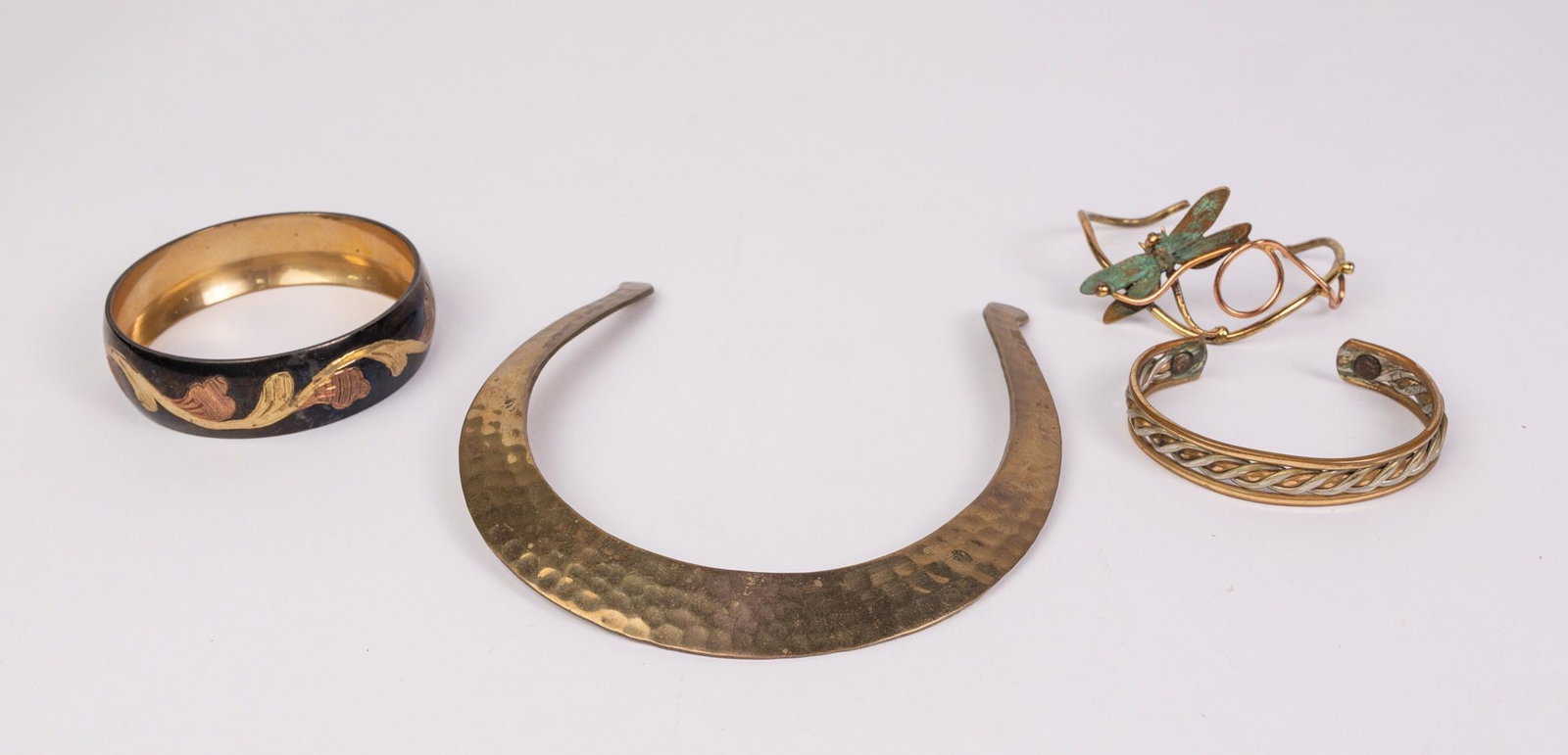 Grouping of Vintage Brass Jewelry: Grouping of Vintage Brass Jewelry Literature Brooks Auction – Online Auction Terms & Conditions Contact: (856) 694-2960 | info@brooks.auction READ BEFORE YOU BID: We want you to feel confident