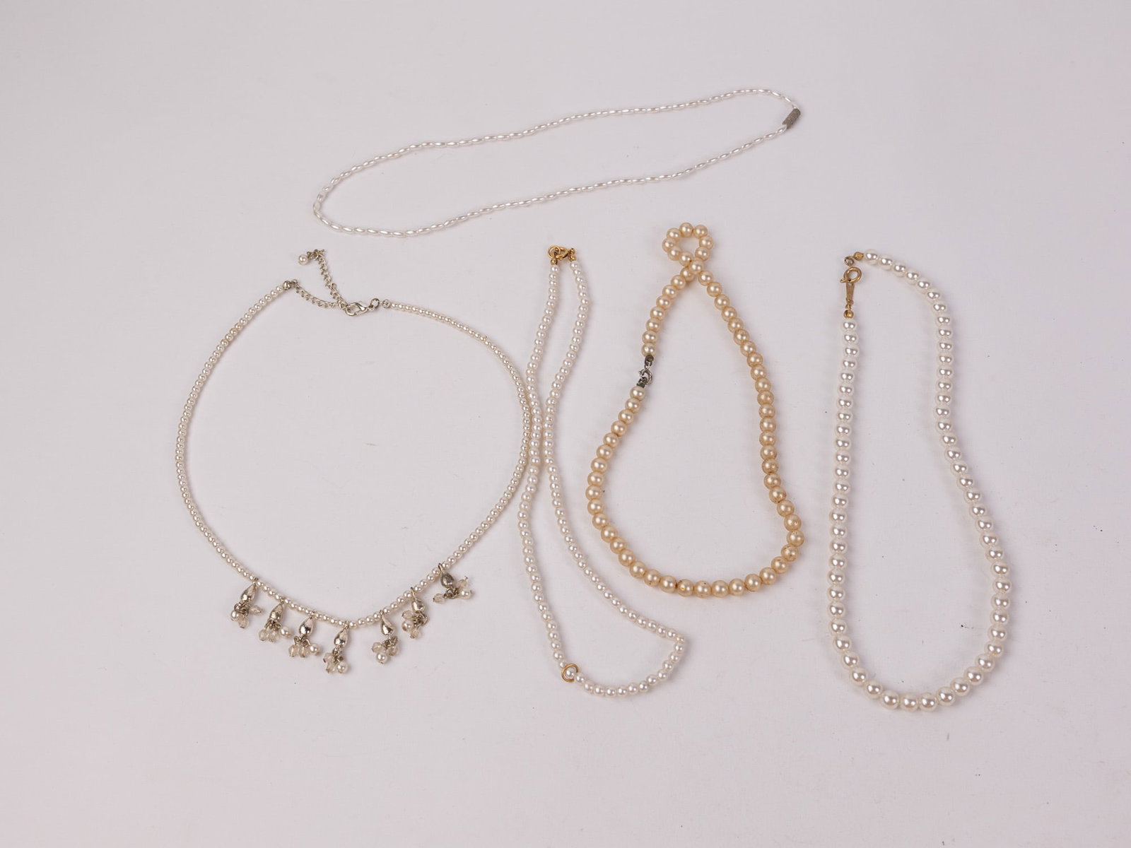 Assortment of Pearl Jewelry: Assortment of Pearl Jewelry Literature Brooks Auction – Online Auction Terms & Conditions Contact: (856) 694-2960 | info@brooks.auction READ BEFORE YOU BID: We want you to feel confident when