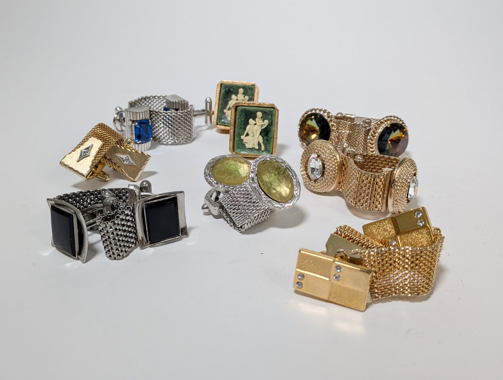 Eight Pairs of Vintage Mesh Cufflinks: Eight Pairs of Vintage Mesh Cufflinks Literature Brooks Auction – Online Auction Terms & Conditions Contact: (856) 694-2960 | info@brooks.auction READ BEFORE YOU BID: We want you to feel