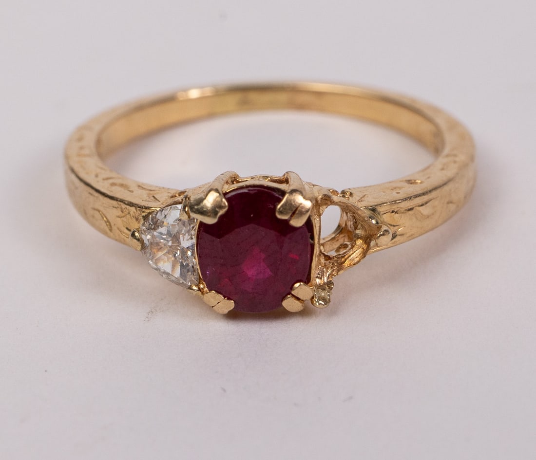 18KY Gold Untreated Ruby and Natural Diamond Ring with Appraisal: Marked "750 10", Size 9, Total weight 4.6. missing one diamond setting. Comes with appraisal write up with an appraised value of 4,750.00 USD circa 2009. Literature Brooks Auction – Online