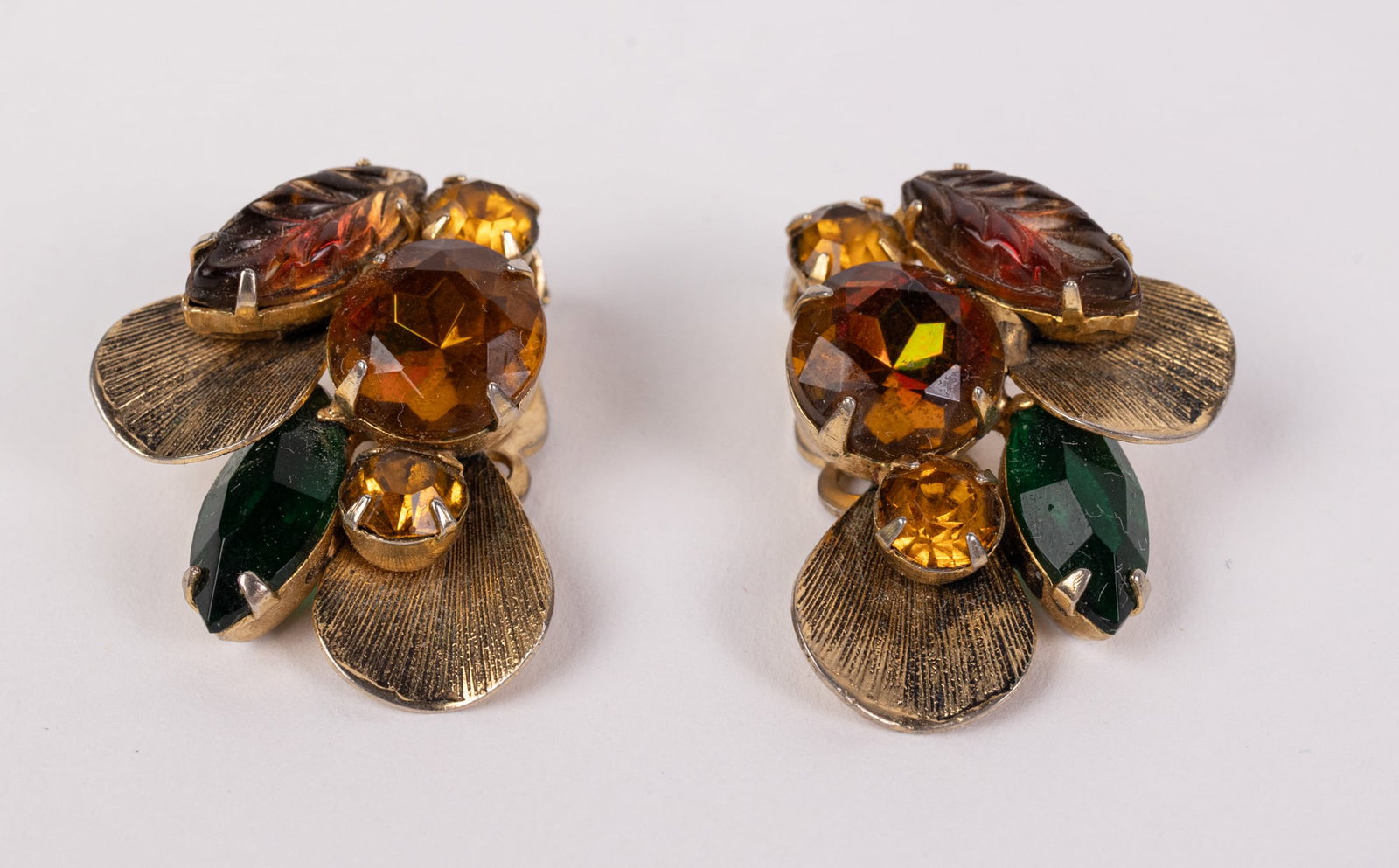 DeLizza & Elster Juliana Heliotrope Earrings: DeLizza & Elster Juliana Heliotrope Earrings Literature Brooks Auction – Online Auction Terms & Conditions Contact: (856) 694-2960 | info@brooks.auction READ BEFORE YOU BID: We want you to feel