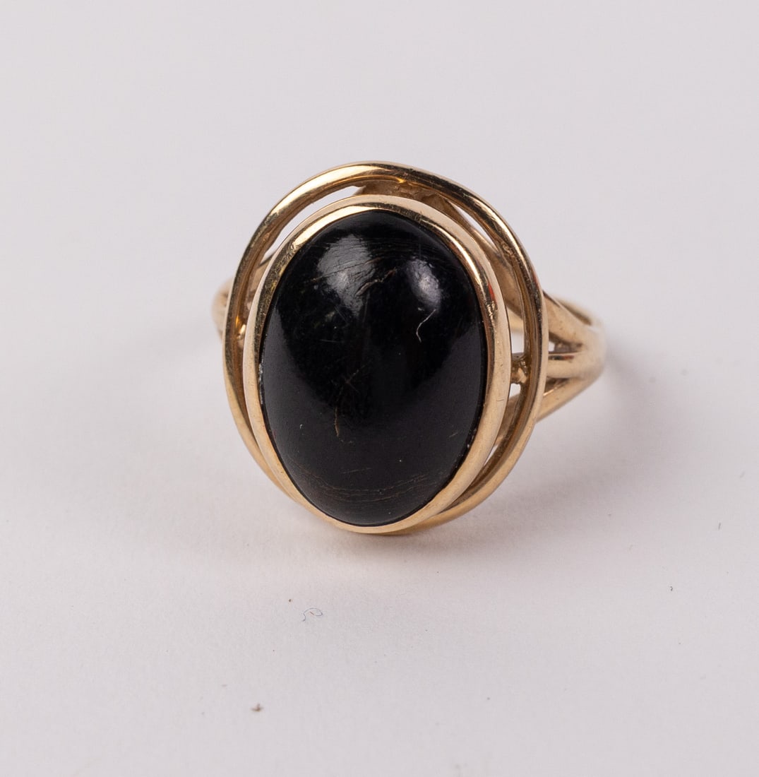 14KY Gold Ring with Black Onyx Cabochon: Marked "14K", Size 5.5, Total weight 3.5 grams Size Size 5.5 Literature Brooks Auction – Online Auction Terms & Conditions Contact: (856) 694-2960 | info@brooks.auction READ BEFORE YOU BID: We