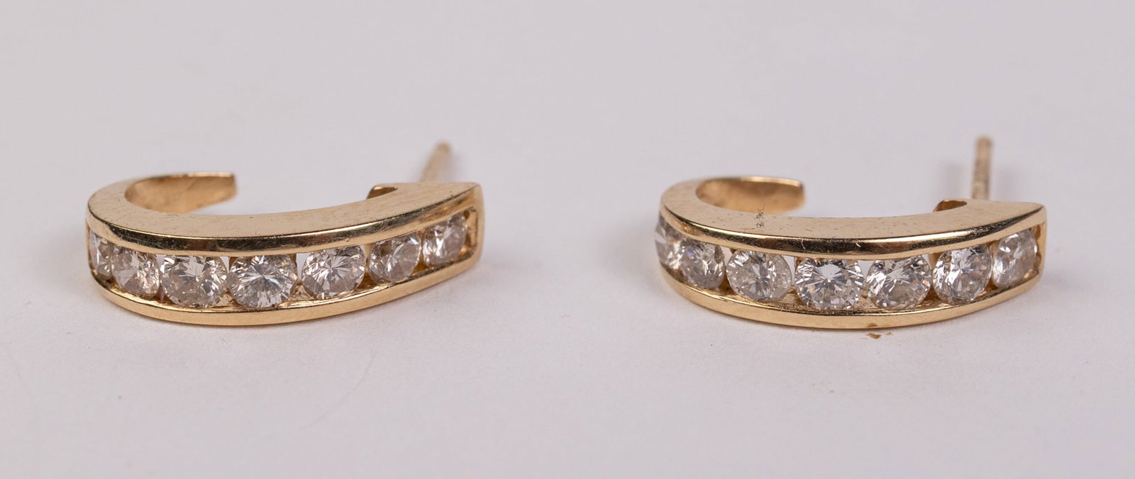 14KY Gold Half-Hoop Earrings: Marked 14K FJG 35", Total weight 2.6 grams Literature Brooks Auction – Online Auction Terms & Conditions Contact: (856) 694-2960 | info@brooks.auction READ BEFORE YOU BID: We want you to feel