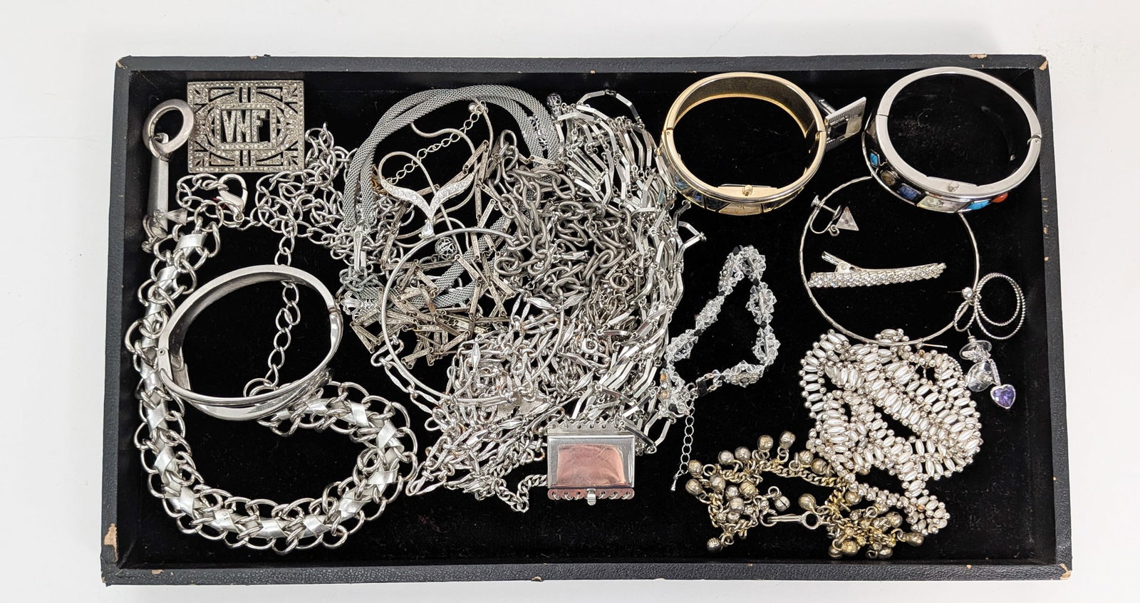 Assortment of Silver-Tone Jewelry: Assortment of Silver-Tone Jewelry Literature Brooks Auction – Online Auction Terms & Conditions Contact: (856) 694-2960 | info@brooks.auction READ BEFORE YOU BID: We want you to feel confident