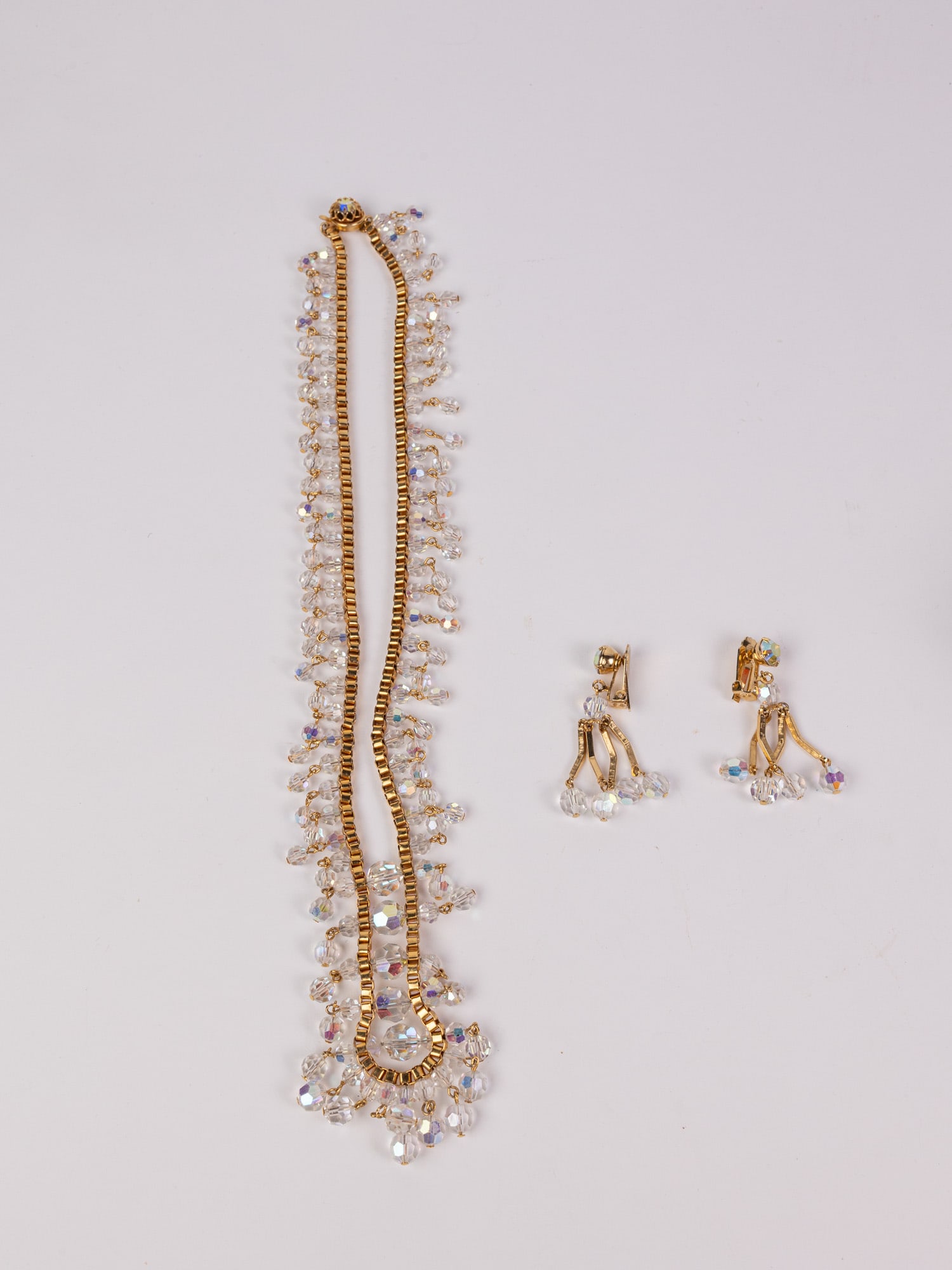 Vintage Gold-Tone and Aurora Borealis Crystal Bead Necklace and Earrings: Vintage Gold-Tone and Aurora Borealis Crystal Bead Necklace and Earrings Literature Brooks Auction – Online Auction Terms & Conditions Contact: (856) 694-2960 | info@brooks.auction READ BEFORE