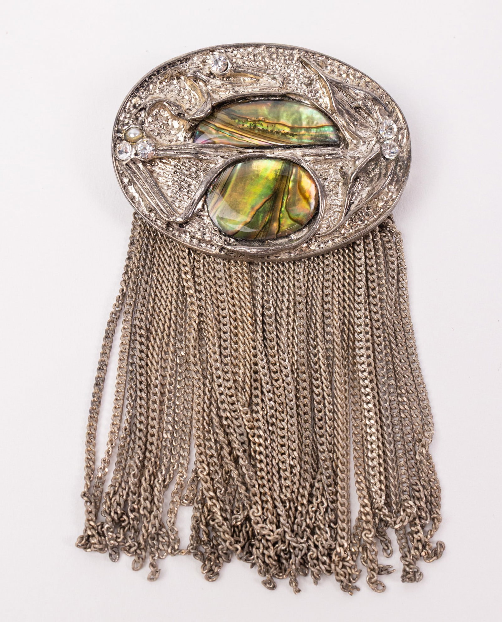 Vintage Art Deco Silver-Tone Abalone Waterfall Brooch: Vintage Art Deco Silver-Tone Abalone Waterfall Brooch Literature Brooks Auction – Online Auction Terms & Conditions Contact: (856) 694-2960 | info@brooks.auction READ BEFORE YOU BID: We want