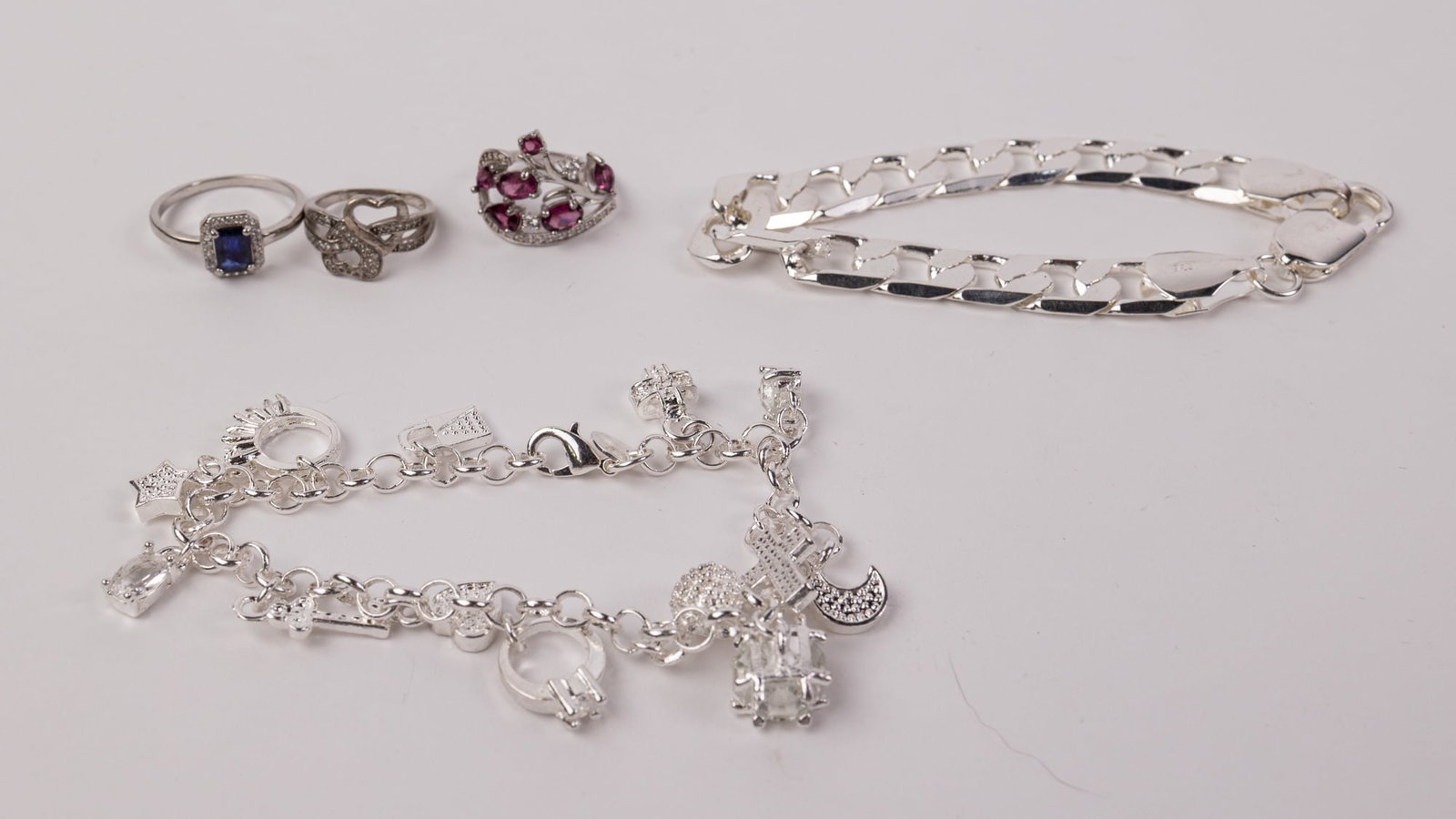 (2) Sterling Silver Bracelets and (3) Sterling Silver Rings: All marked "925", Total weight is 53.7 Literature Brooks Auction – Online Auction Terms & Conditions Contact: (856) 694-2960 | info@brooks.auction READ BEFORE YOU BID: We want you to feel