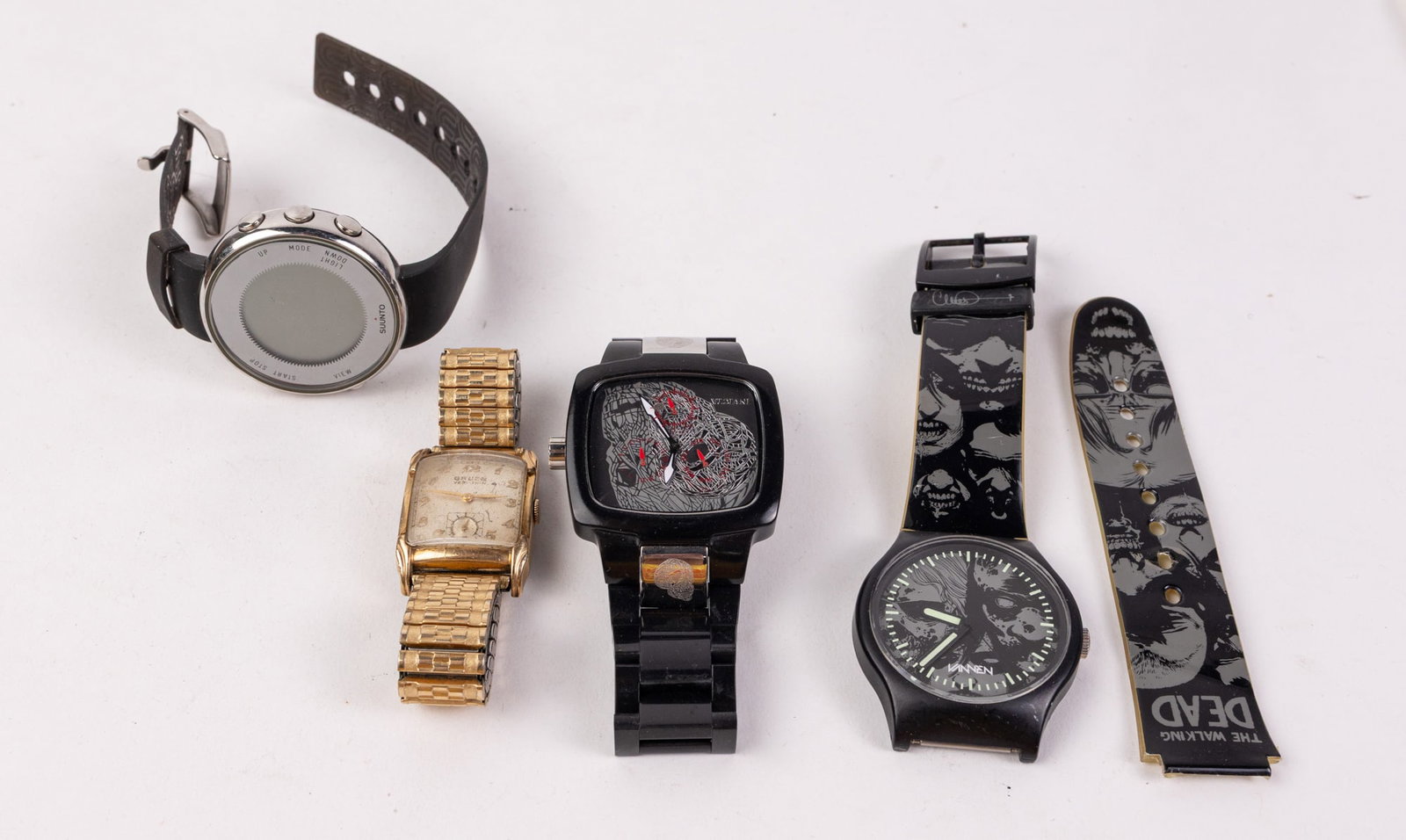 Assorted Watches Featuring Suunto Lumi: Lot includes Suunto Lumi watch, Vannen 2013 Walking Dead Watch, Invicta Artist collection Model 5899, and Gruen Veri-Thin watch Literature Brooks Auction – Online Auction Terms & Conditions