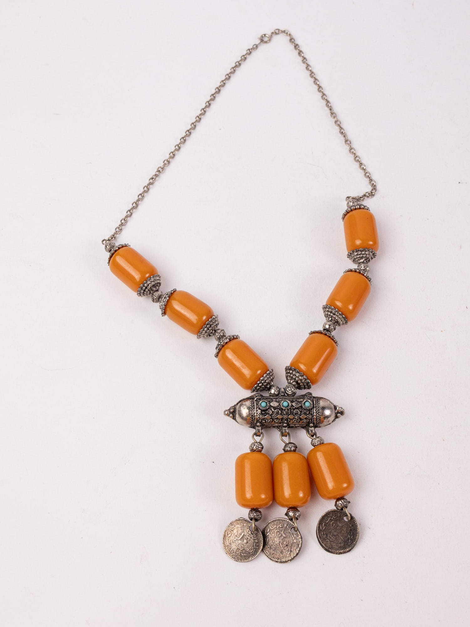 Vintage Middle Eastern Butterscotch Statement Necklace with Hirz Pendant: Vintage Middle Eastern Butterscotch Statement Necklace with Hirz Pendant Literature Brooks Auction – Online Auction Terms & Conditions Contact: (856) 694-2960 | info@brooks.auction READ BEFORE