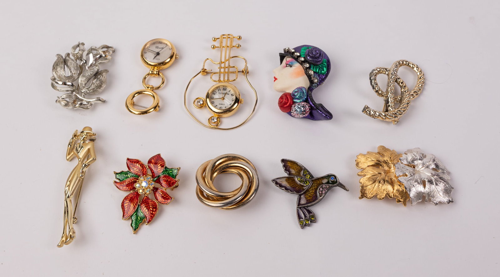 Grouping of Assorted Vintage Brooches: Grouping of Assorted Vintage Brooches Literature Brooks Auction – Online Auction Terms & Conditions Contact: (856) 694-2960 | info@brooks.auction READ BEFORE YOU BID: We want you to feel