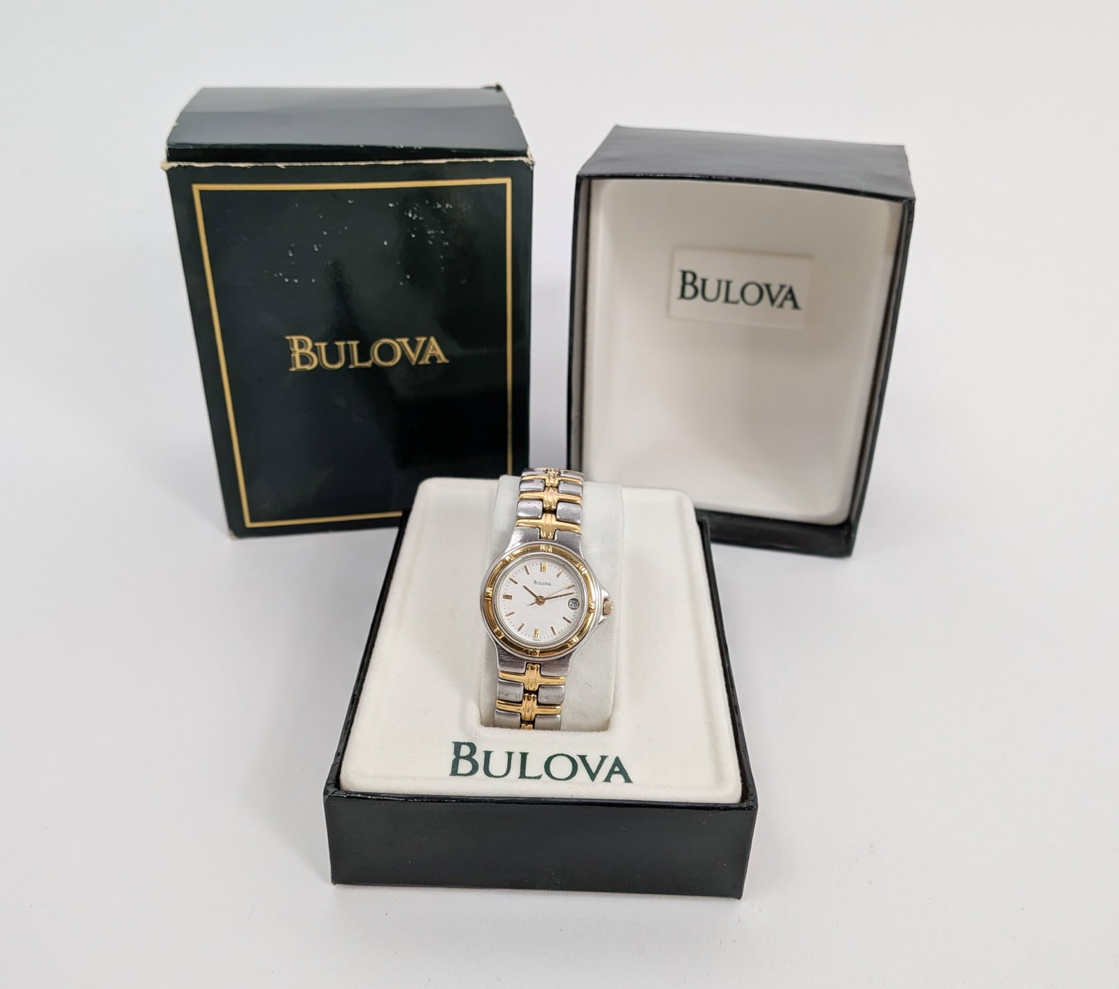 Vintage Bulova Two-Tone Dress Watch with White Dial w/ Date Indicator: Vintage Bulova Two-Tone Dress Watch with White Dial w/ Date Indicator Literature Brooks Auction – Online Auction Terms & Conditions Contact: (856) 694-2960 | info@brooks.auction READ BEFORE YOU 