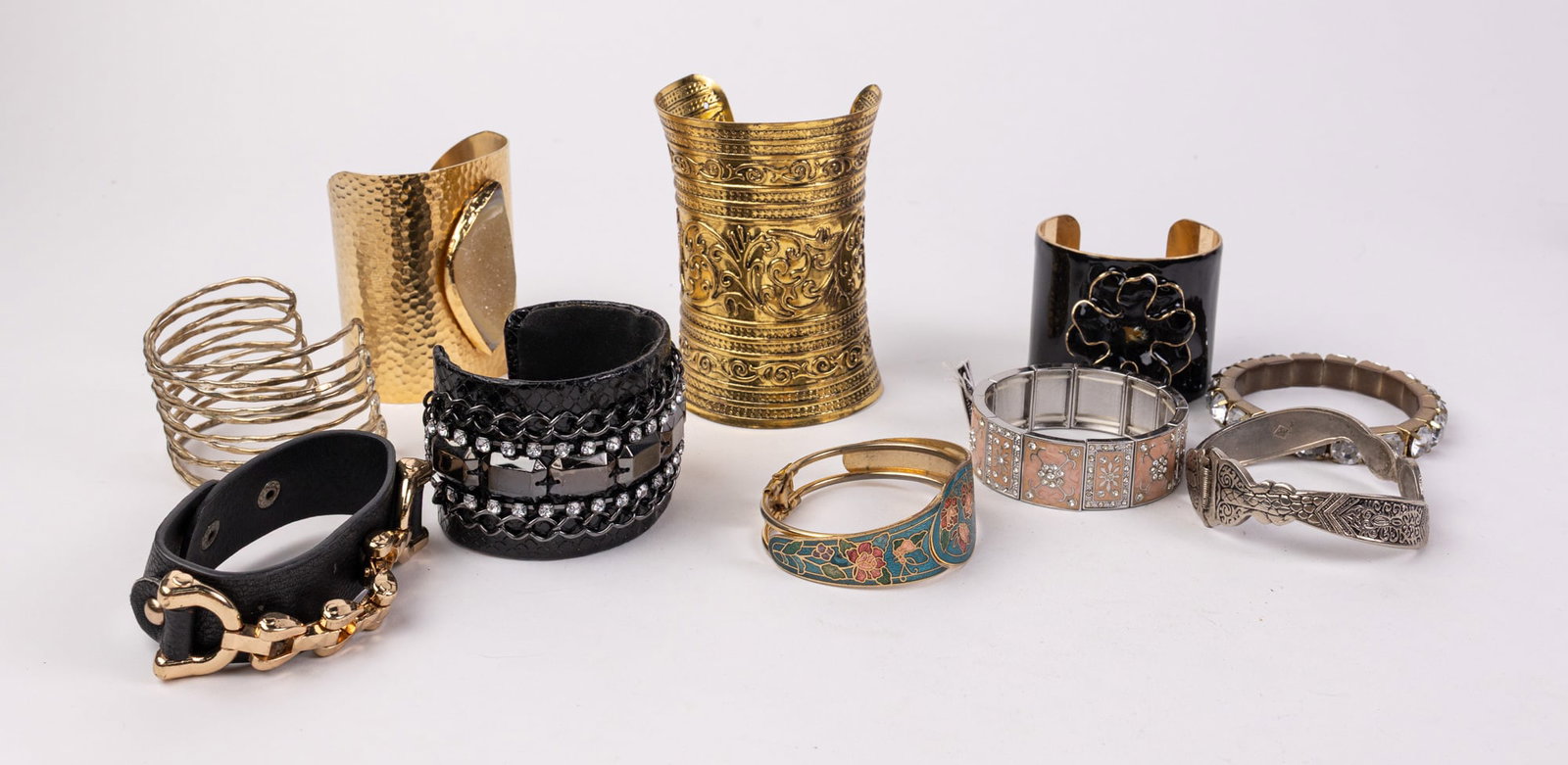 Assortment of Bangles and Bracelets: Assortment of Bangles and Bracelets Literature Brooks Auction – Online Auction Terms & Conditions Contact: (856) 694-2960 | info@brooks.auction READ BEFORE YOU BID: We want you to feel