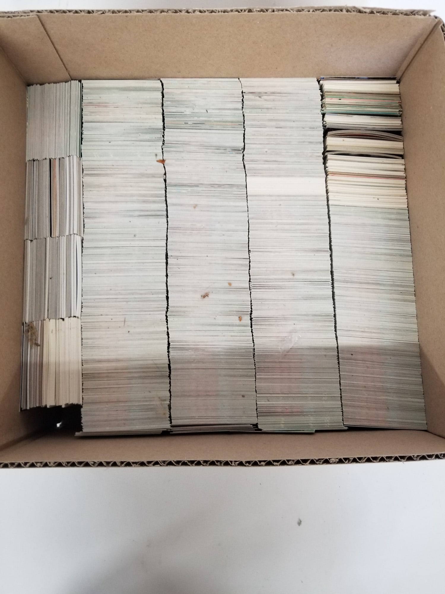 Assortment of Sports Cards: This assortment of sports cards features players across a few different sports from different trading cards sets Size 7" x 12" x 12" Literature Brooks Auction – Online Auction Terms &