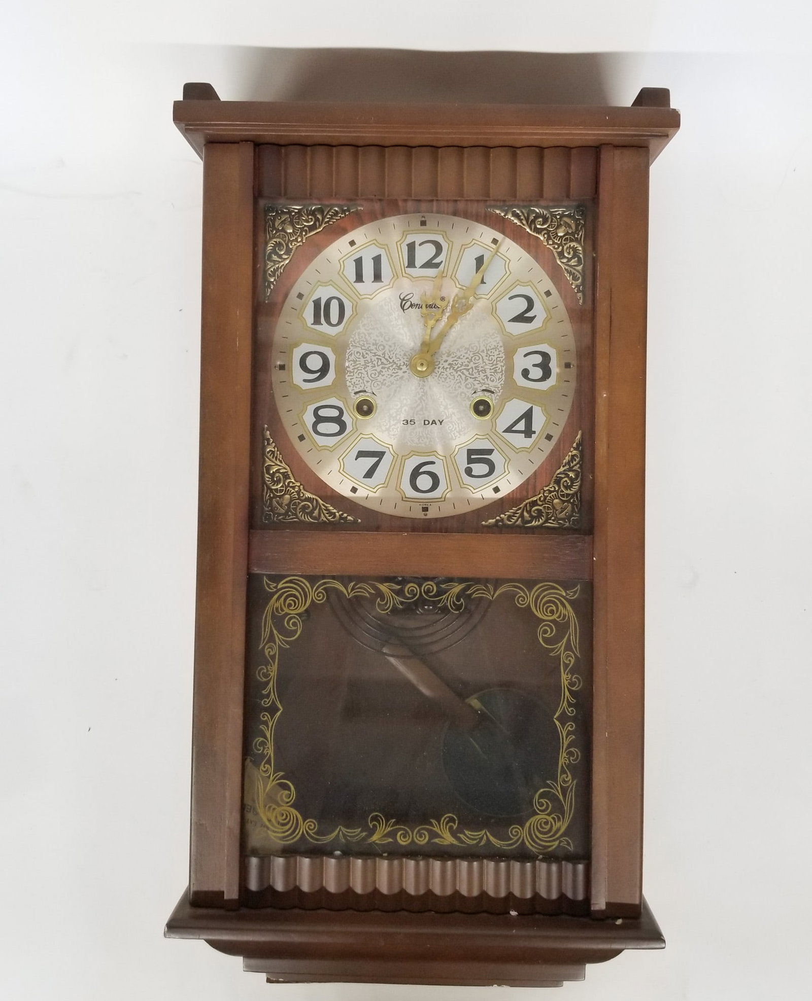 Centurion 35 Day Pendulum Wall Clock: Centurion 35 Day Pendulum Wall Clock Size 21" x 11" x 5" Literature Brooks Auction – Online Auction Terms & Conditions