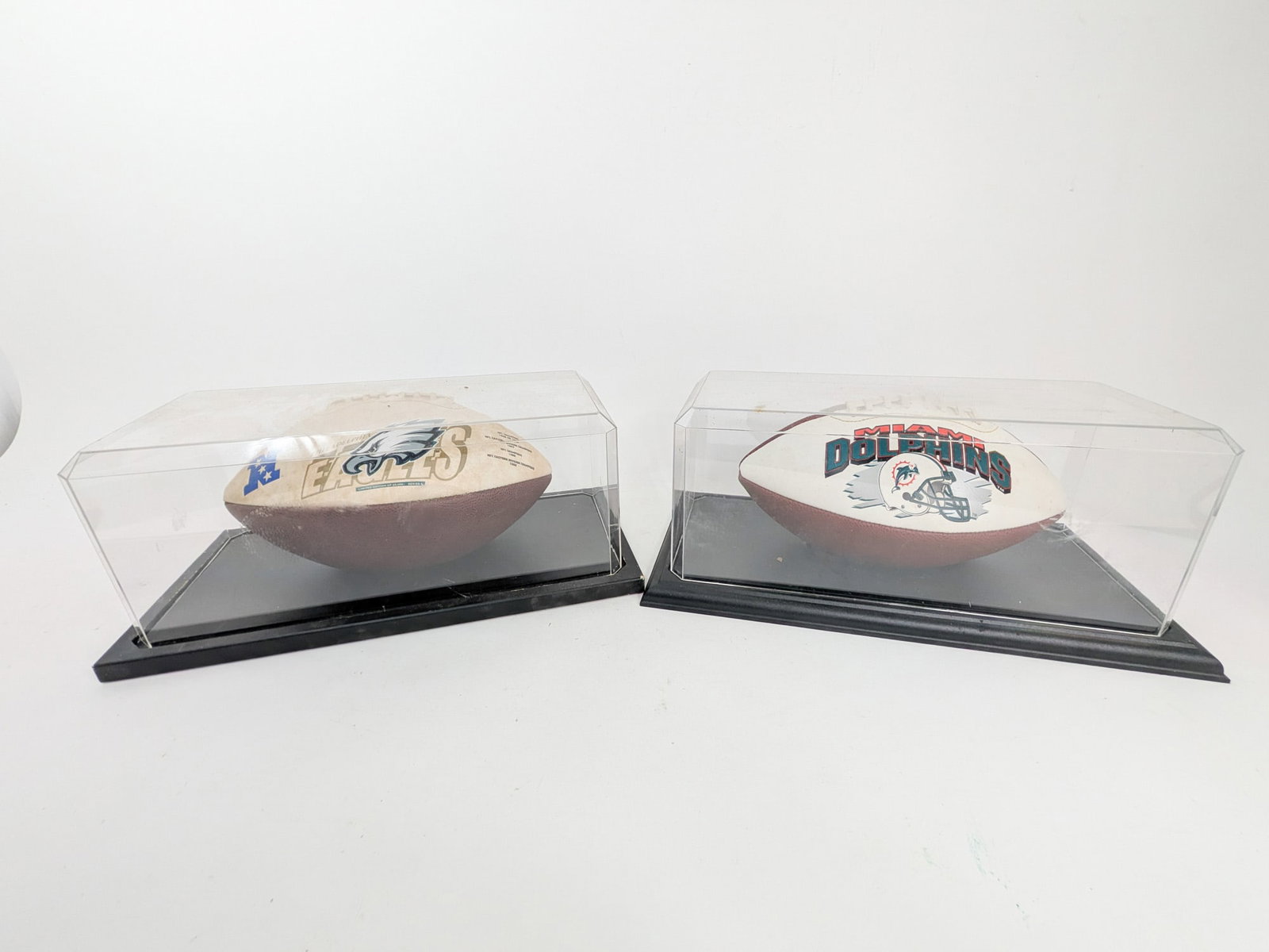 Assortment of Sports Memorabilia ft. Pucks with Signatures - 5
