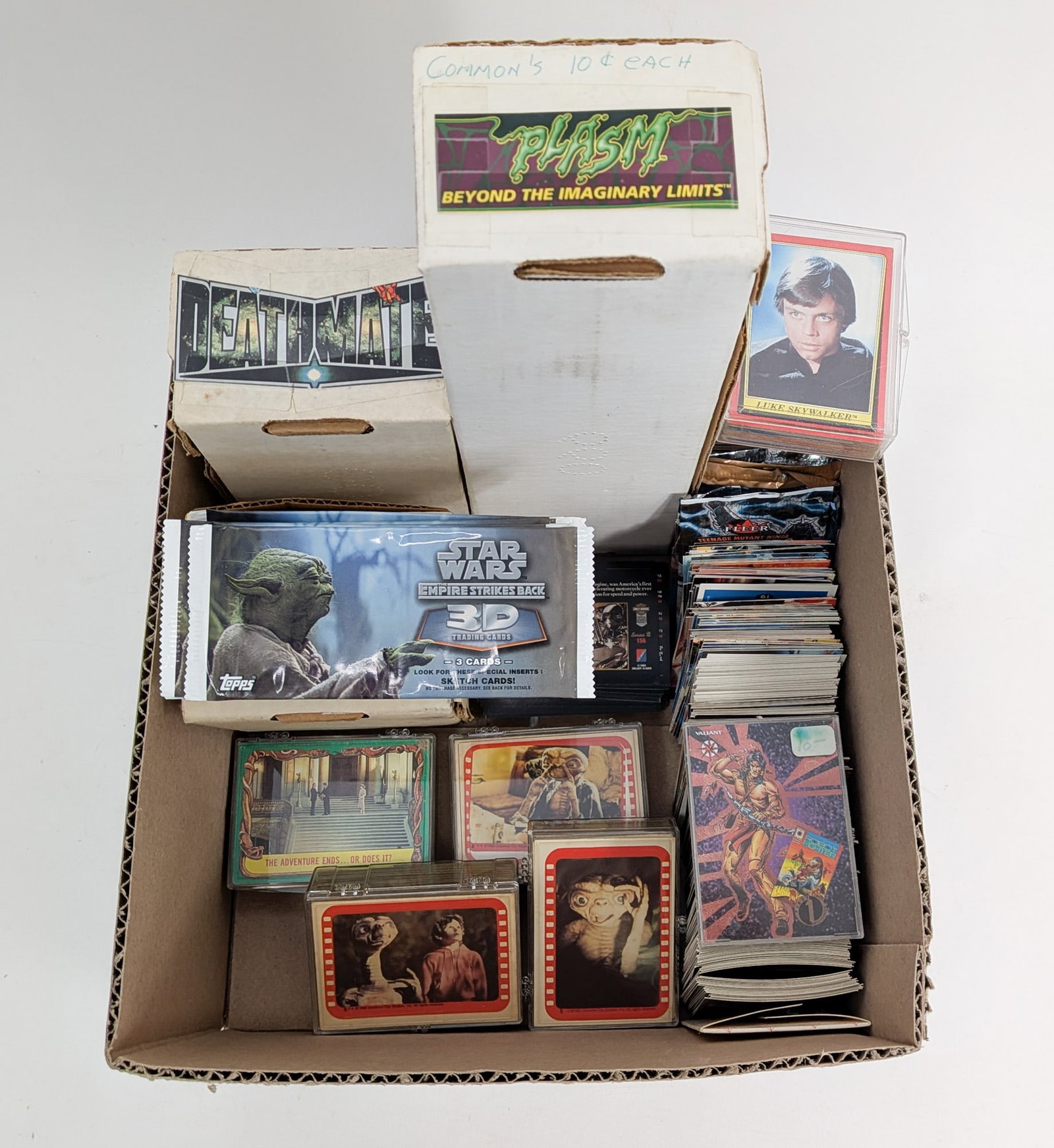 Assortment of Pop Culture Trading Cards: This assortment of pop culture trading cards features themes such as Batman, Star Wars, Akira, and so many more! Size 7" x 12" x 12" Literature Brooks Auction – Online Auction Terms &