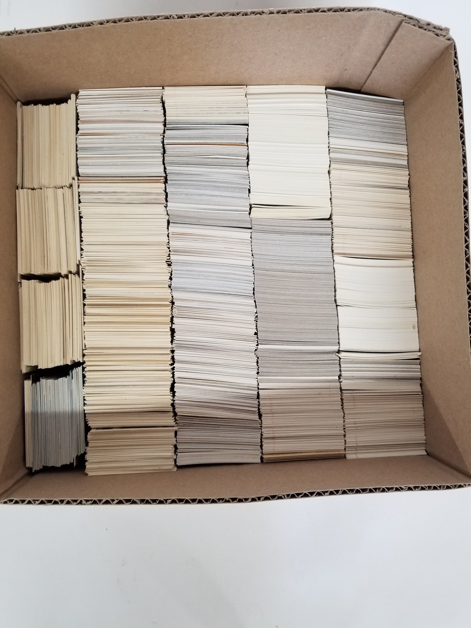 Assortment of Sports Cards: This assortment of sports cards features players across a few different sports from different trading cards sets Size 7" x 12" x 12" Literature Brooks Auction – Online Auction Terms &