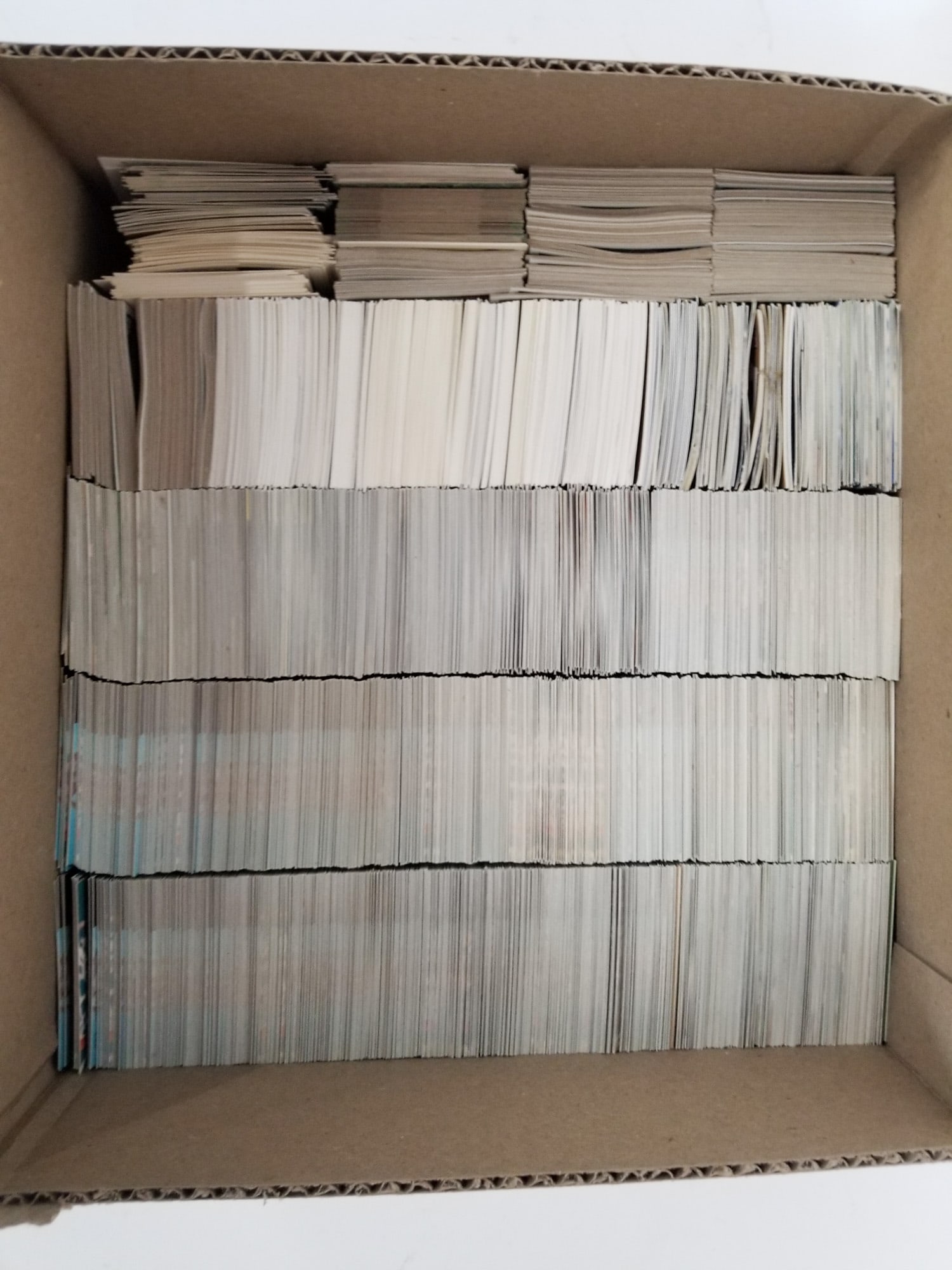 Assortment of Sports Cards: This assortment of sports cards features players across a few different sports from different trading cards sets Size 7" x 12" x 12" Literature Brooks Auction – Online Auction Terms &