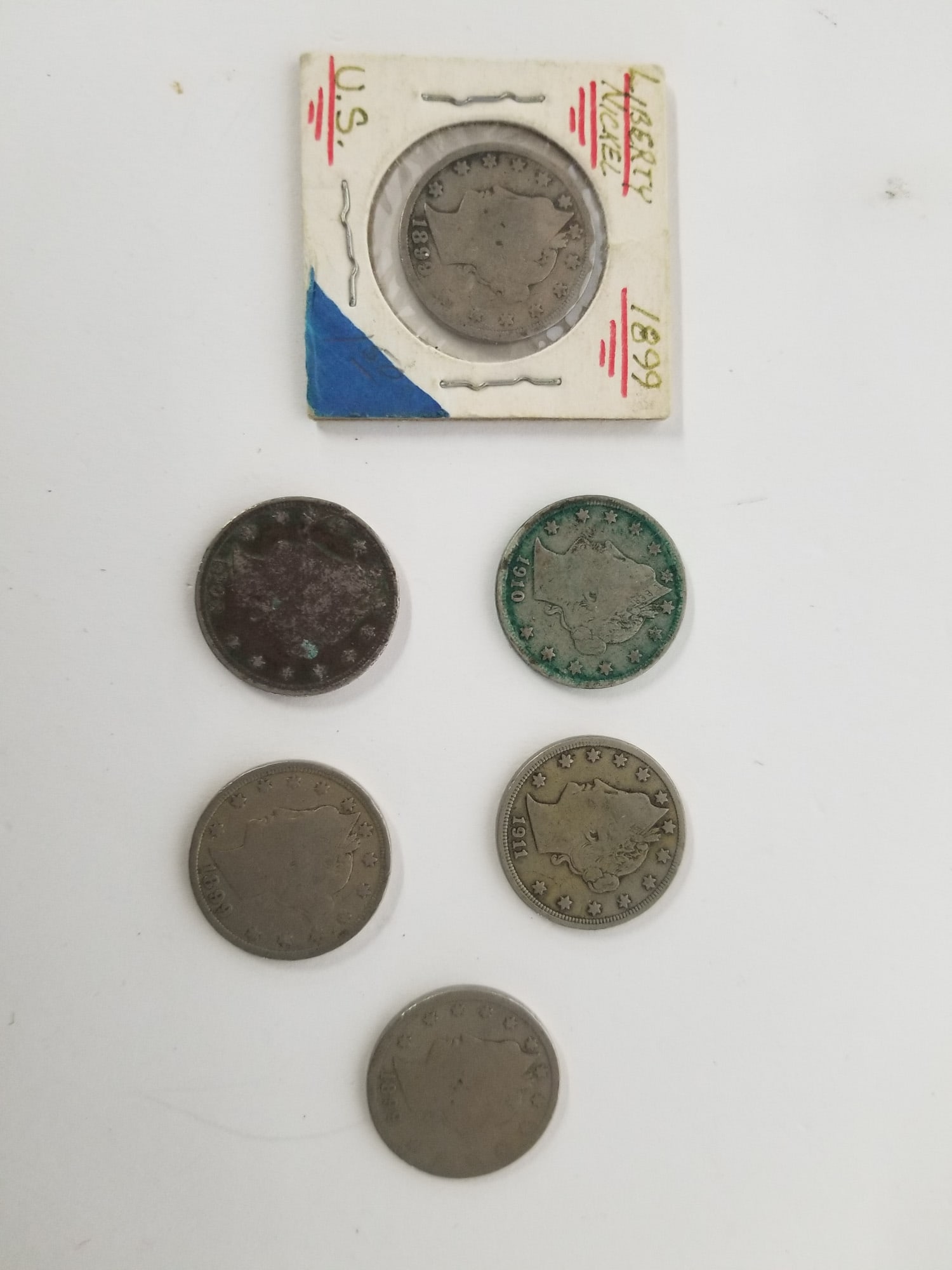 Six Liberty Head "V" Nickels: (3) 1899 Liberty Head Nickels - 1903 Liberty Head Nickel - 1910 Liberty Head Nickel - 1911 Liberty Head Nickel Literature Brooks Auction – Online Auction Terms & Conditions Contact: (856) 694-29