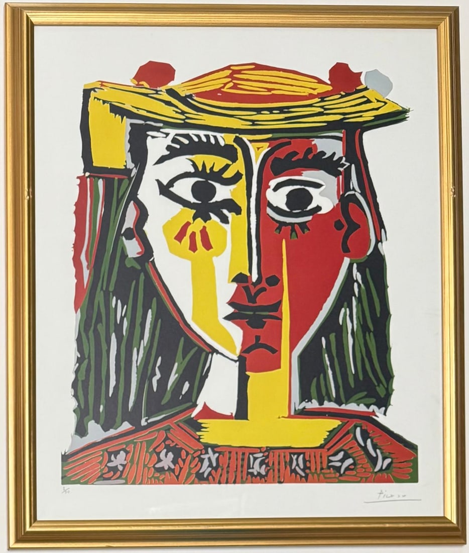 Pablo Picasso Spanish Linocut on Arches Paper In The Style Of. Dali, Magritte, & Picasso Era: Title: Portrait of a Woman in a Hat with Pompoms and a Printed BlouseDate: 1962Medium: Linocut on Arches PaperImage Size: 25 in x 21 inSheet Size: 29 ½ in x 24 ½ inThis bold and striking