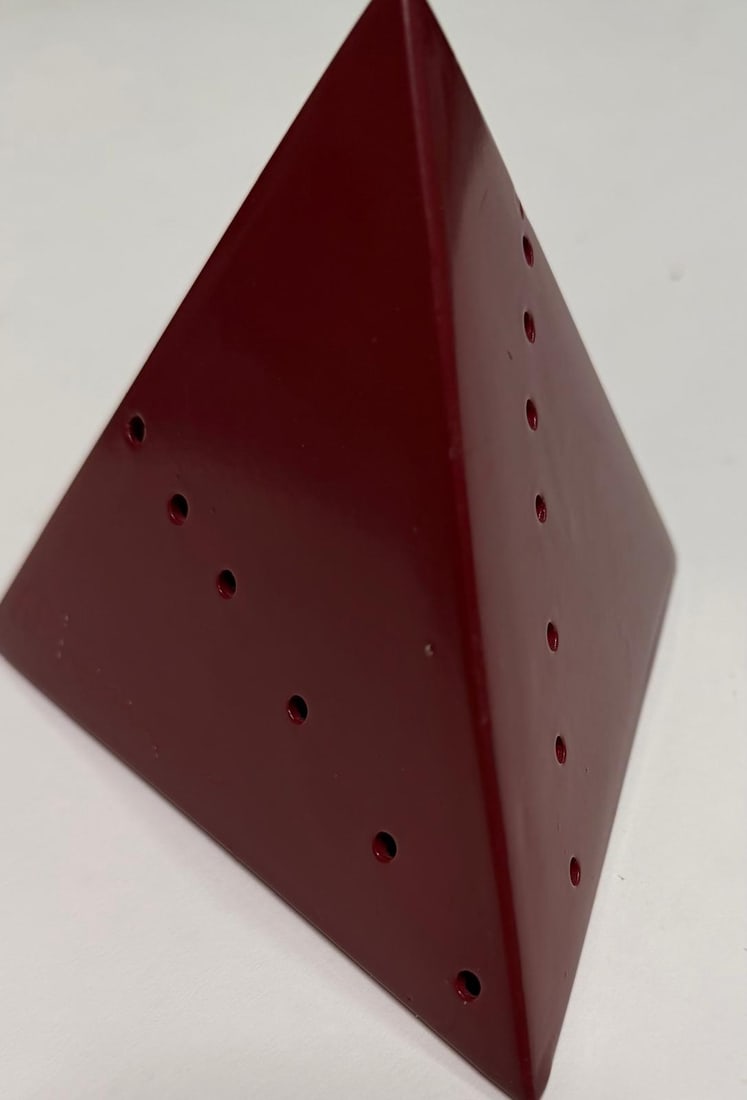 Lucio Fontana Argentine 1899-1968 Pyramid red, AP. In the Style Of.B17: Title: Red Spatial Pyramid Technique: Painted resin sculpture Measures: 5 × 5 × 5 inches (approximately 13 × 13 × 13 cm) Year: Circa late 20th century Condition: Good — the surfaces appear stabl