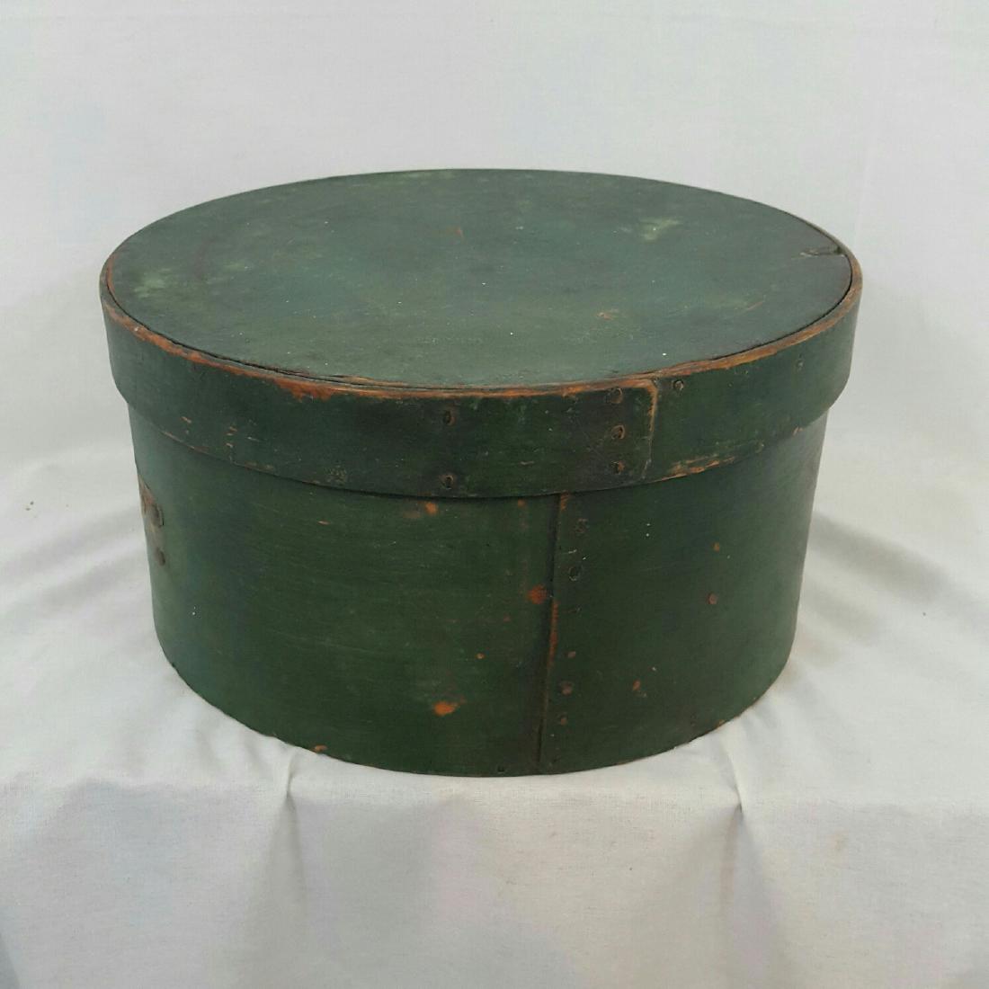 Emerald Green Pantry Box: Item: Emerald green pantry box. Date: Mid 19th century. Size: 10" diameter x 5 1/8" high Please note that this lot has a confidential reserve. When you leave a bid in advance of the auction, submit yo