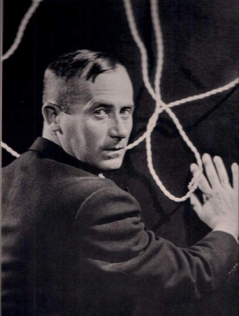 MAN RAY - Portrait of Joan Miro: Artist: MAN RAY Print Title: Portrait of Joan Miro Medium: Heliogravure with tissue guard Printed in 1980 in Italy Image Size: 7.5" X 9.5" Paper Size: 11.5" x 15.5" Man Ray, original name Emmanuel Rad