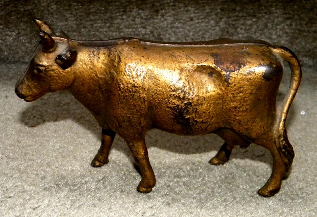 Cast Iron Cow Still Bank (1 of 3)