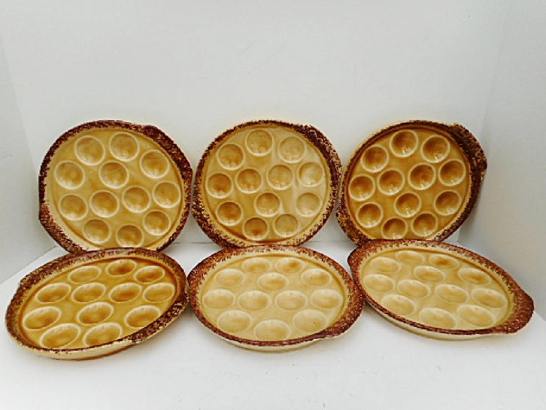 Set of 6 Gien Porcelain Escargot Plates: Item: Set of 6 Gien Porcelain Escargot Plates Origin: France Date: circa 1970. Size: 8 1/2" handle to handle. Weight: 7lbs 1oz. Please note that this lot has a confidential reserve. When you leave a b