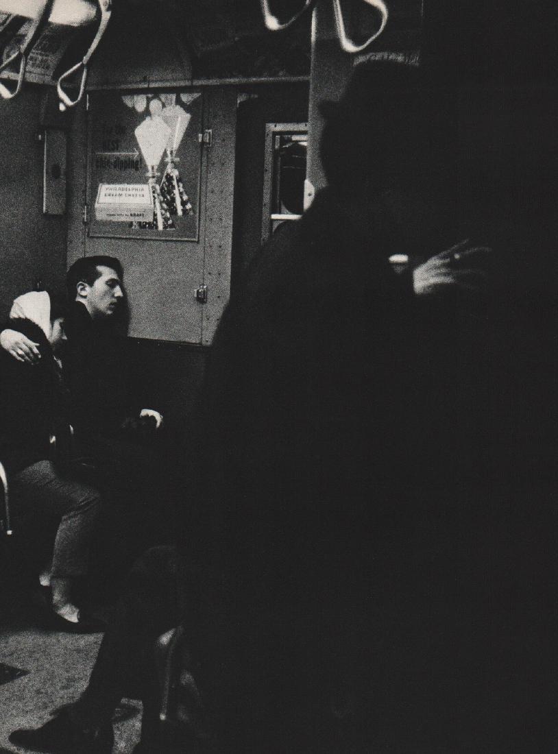 WINOGRAND: Love in the Subway III: Print Title: Love in the Subway III Artist: Gary Winogrand Printing Date: 1962 Medium: Sheet fed Copper plate gravure Printing Location: USA Image Size: 9.5 x 12 inches Gary Winogrand (1928-1984) was 