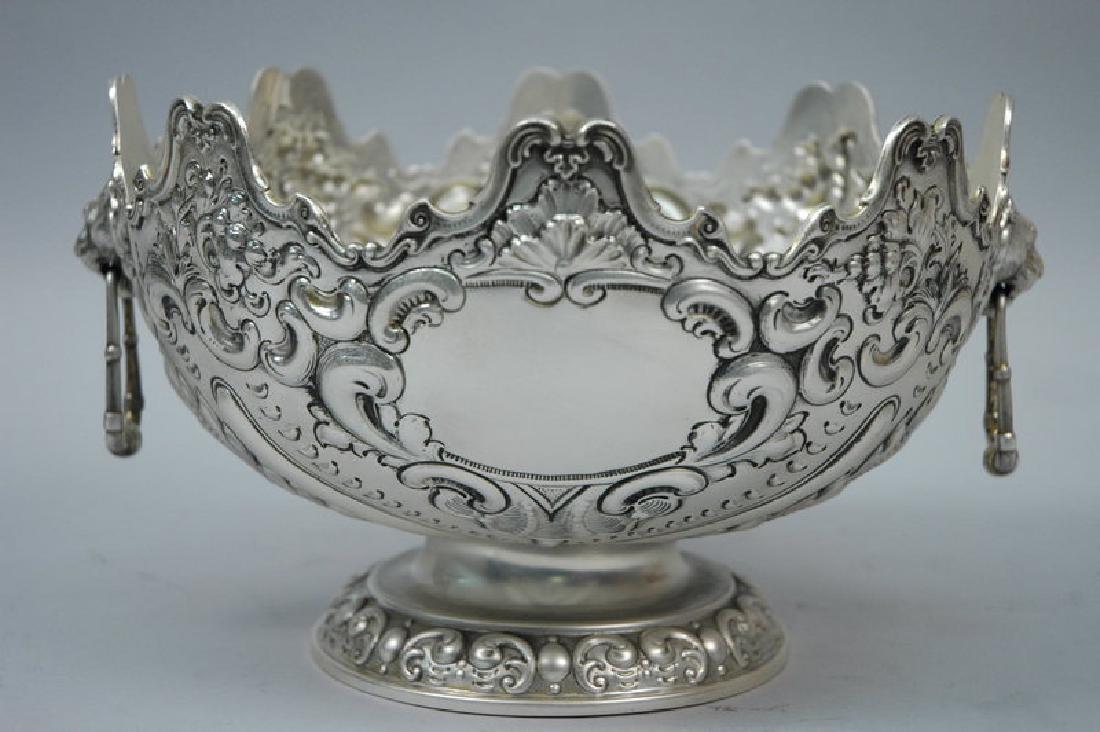 Antique English Sterling Silver Monteith Bowl 1895: This is a very handsome sterling silver monteith bowl by the London firm of Slater, Slater and Holland in a Rococo Revival design. This fantastic circular monteith stands on a circular footring with r