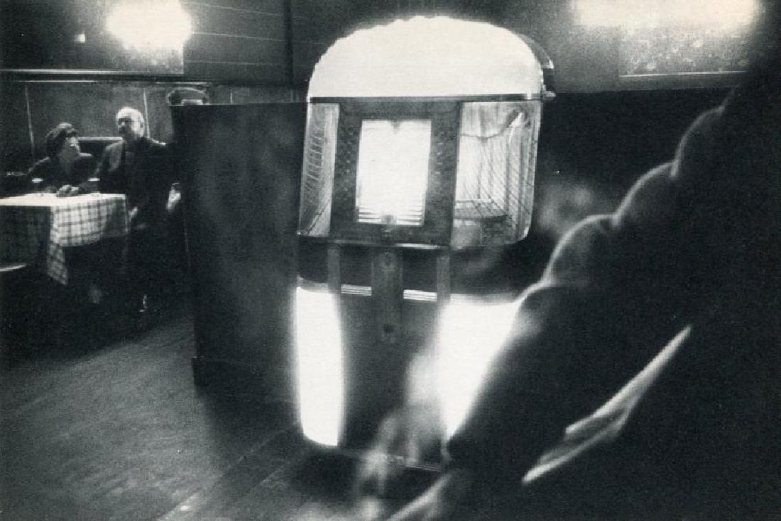 ROBERT FRANK: Bar, N.Y.C.: Artist: ROBERT FRANK Print Title: Bar, N.Y.C. Medium: Vintage Sheet-fed Gravure Printed in 1958 in France Image Size: 7.5 x 5 inches Robert Frank (b. 1924) is an American photographer and documentary